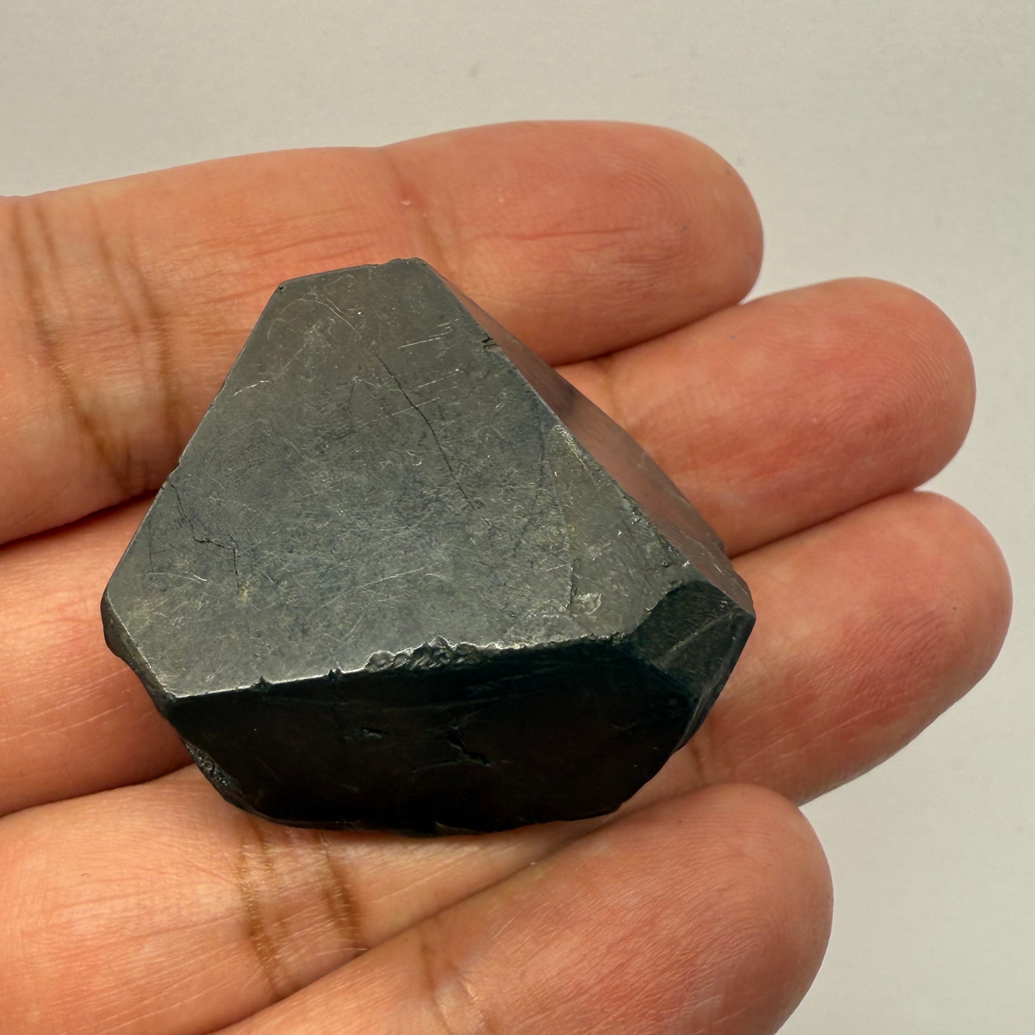 Alabandite Crystal, Merelani, same mining pit as Tanzanite, comes out with Tanzanite, Tanzania, Untreated Unheated. 43.3gm 34.7 x 32.9 x 23.5mm