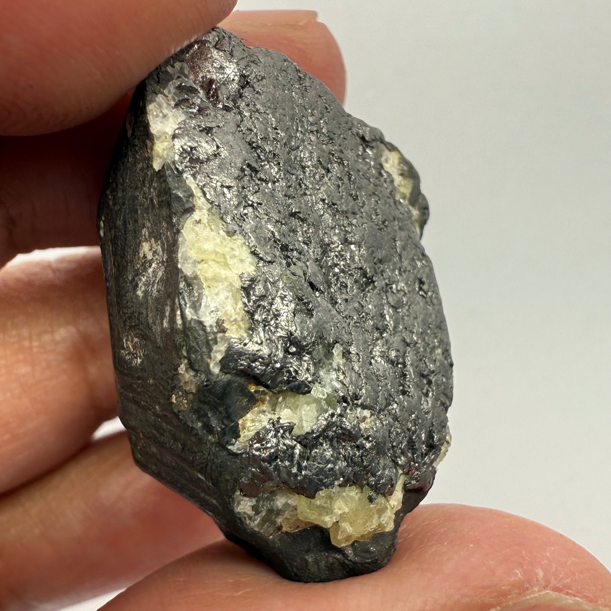 Alabandite Crystal, Merelani, same mining pit as Tanzanite, comes out with Tanzanite, Tanzania, Untreated Unheated. 25.4gm 31.7 x 23.3 x 18.6mm