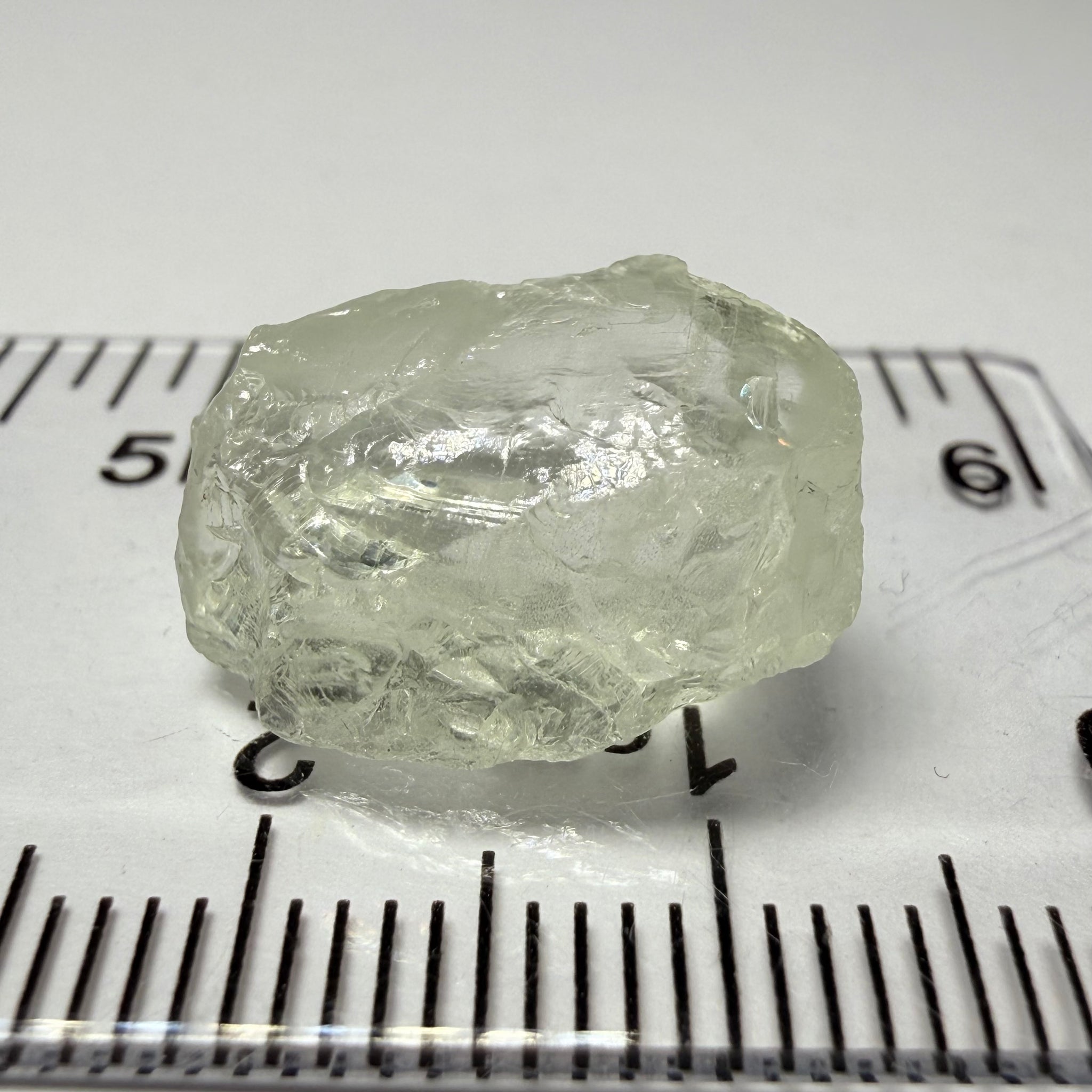 Colourless Beryl, 11.65ct, Loliondo, Tanzania, Untreated Unheated, slightly milky, flattish shape, vs
