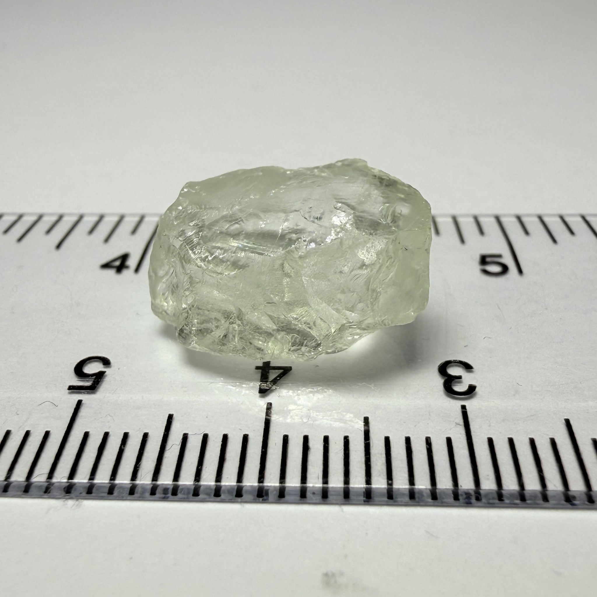 Colourless Beryl, 11.65ct, Loliondo, Tanzania, Untreated Unheated, slightly milky, flattish shape, vs