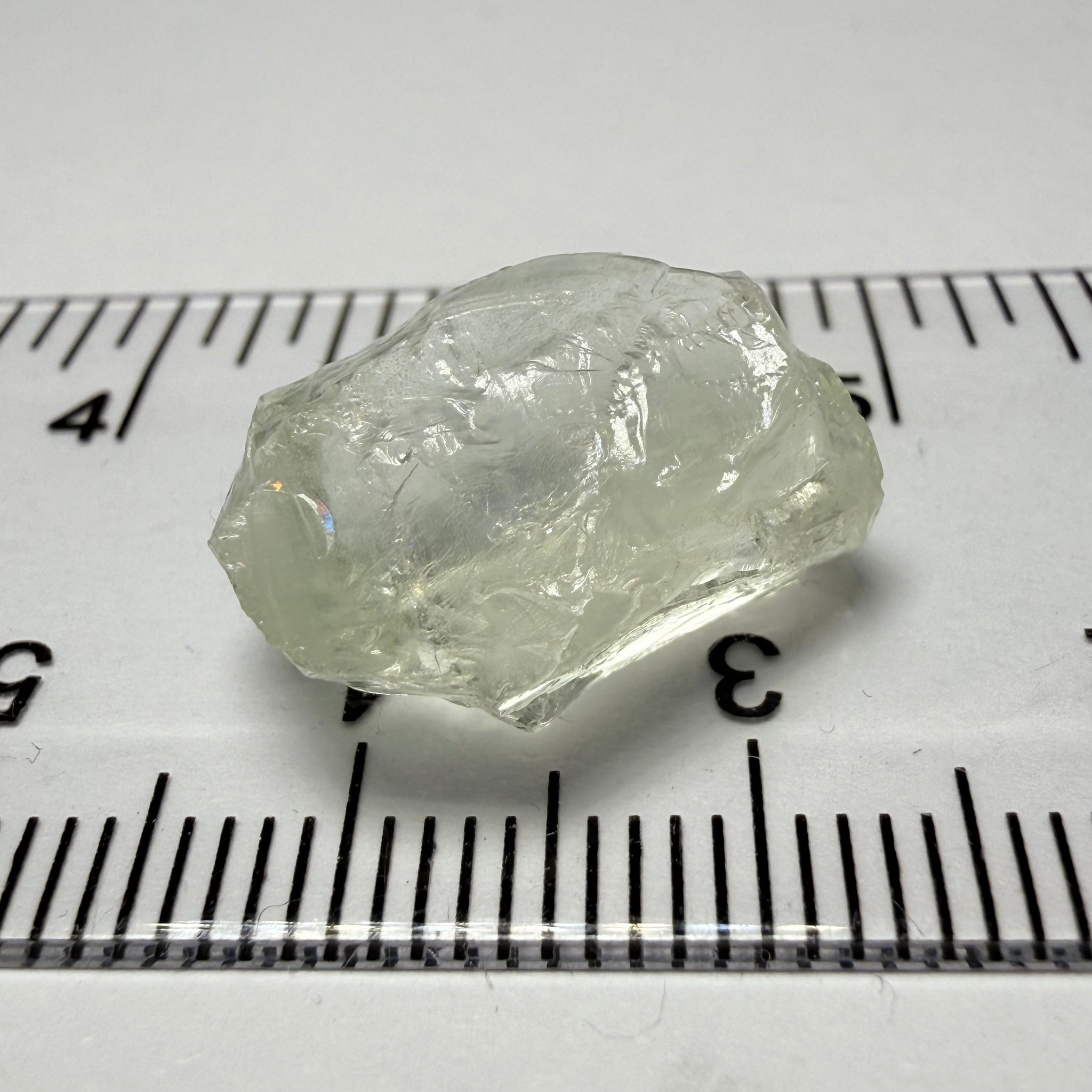 Colourless Beryl, 11.65ct, Loliondo, Tanzania, Untreated Unheated, slightly milky, flattish shape, vs