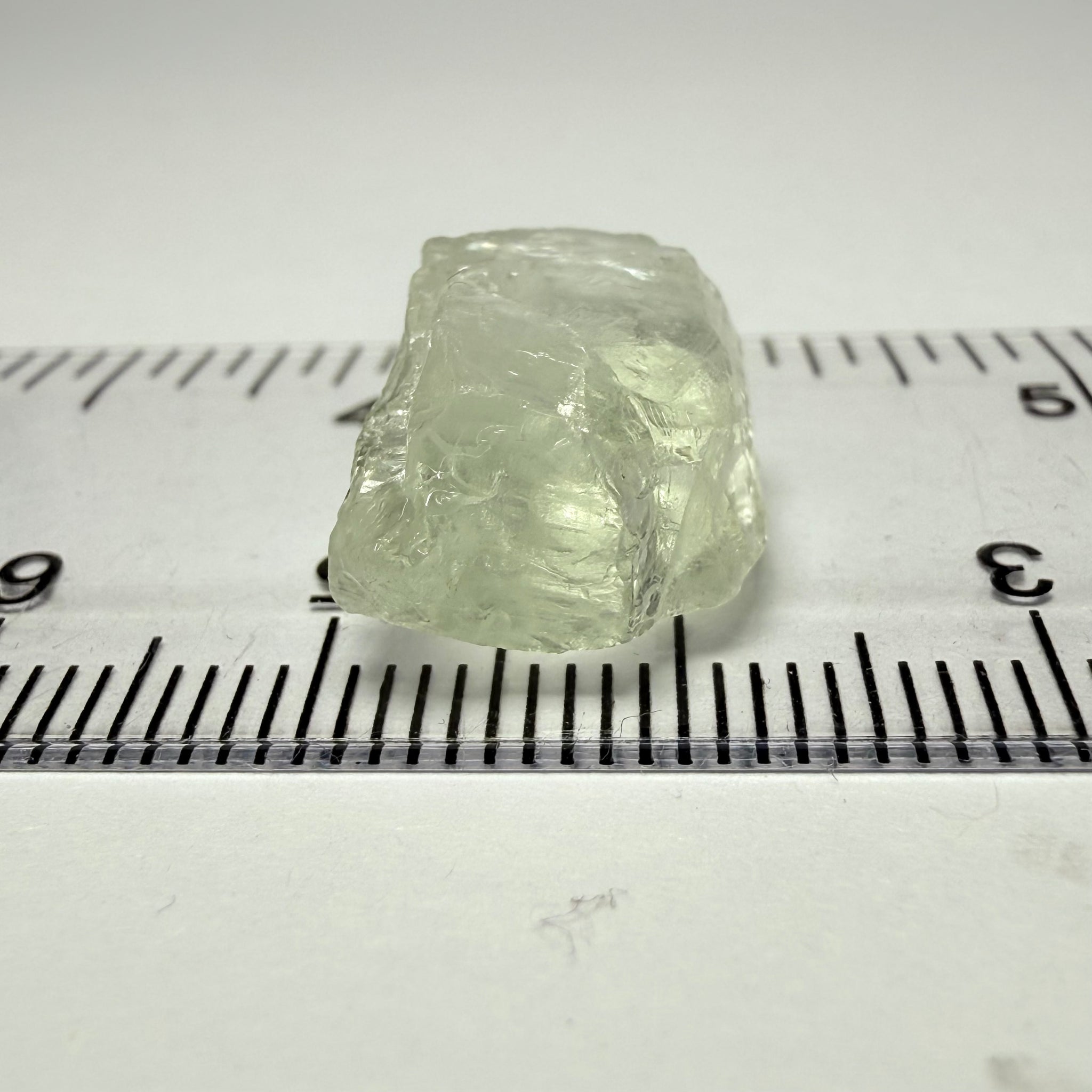 Colourless Beryl, 11.65ct, Loliondo, Tanzania, Untreated Unheated, slightly milky, flattish shape, vs