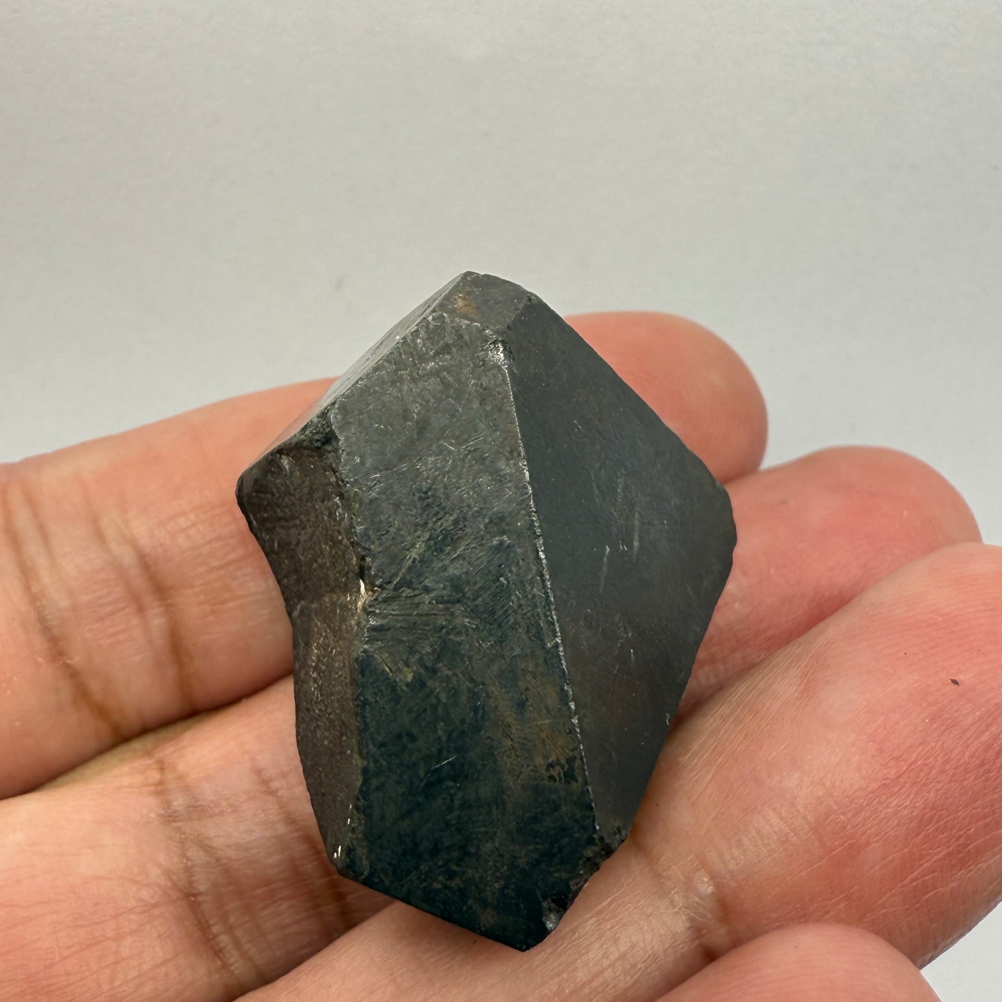 Alabandite Crystal, Merelani, same mining pit as Tanzanite, comes out with Tanzanite, Tanzania, Untreated Unheated. 29.5gm 29.9 x 28.0 x 24.2mm