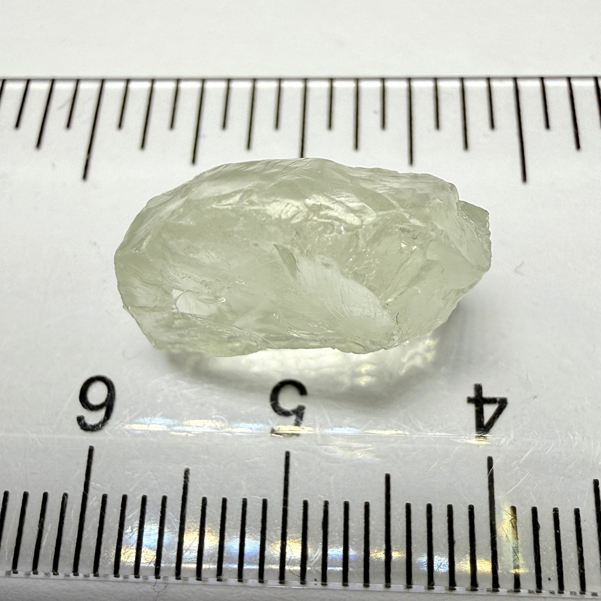 Colourless Beryl, 11.65ct, Loliondo, Tanzania, Untreated Unheated, slightly milky, flattish shape, vs