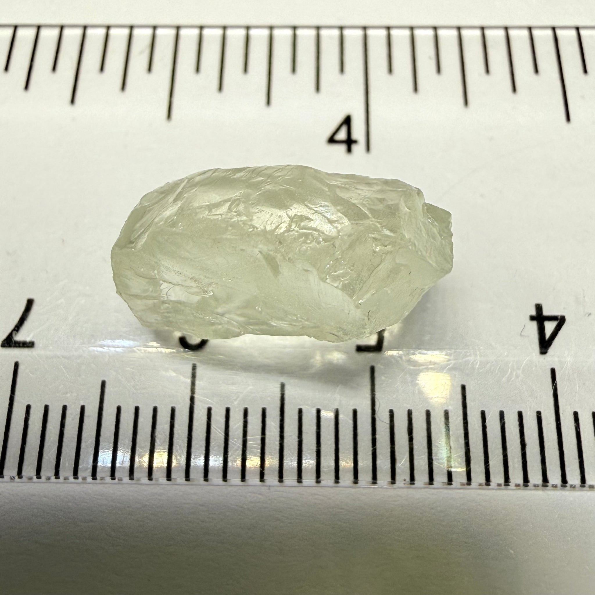 Colourless Beryl, 11.65ct, Loliondo, Tanzania, Untreated Unheated, slightly milky, flattish shape, vs