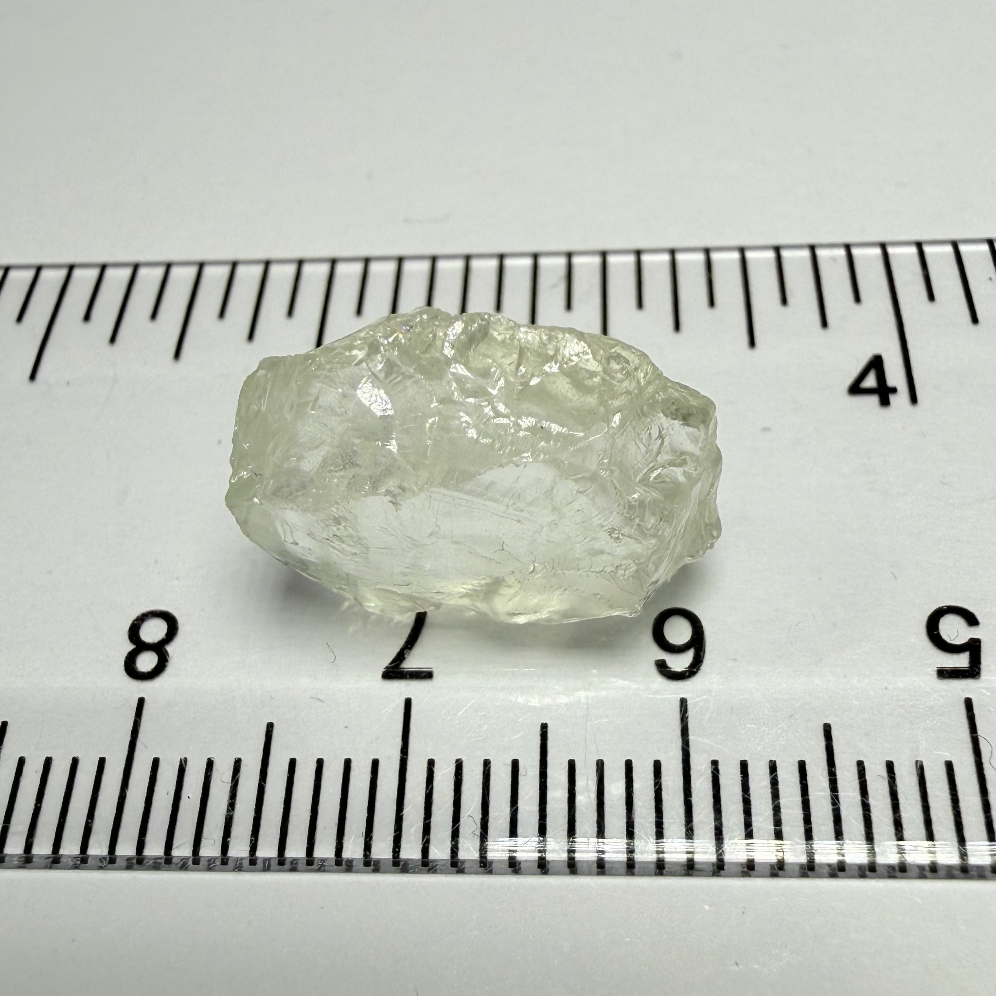 Colourless Beryl, 11.65ct, Loliondo, Tanzania, Untreated Unheated, slightly milky, flattish shape, vs