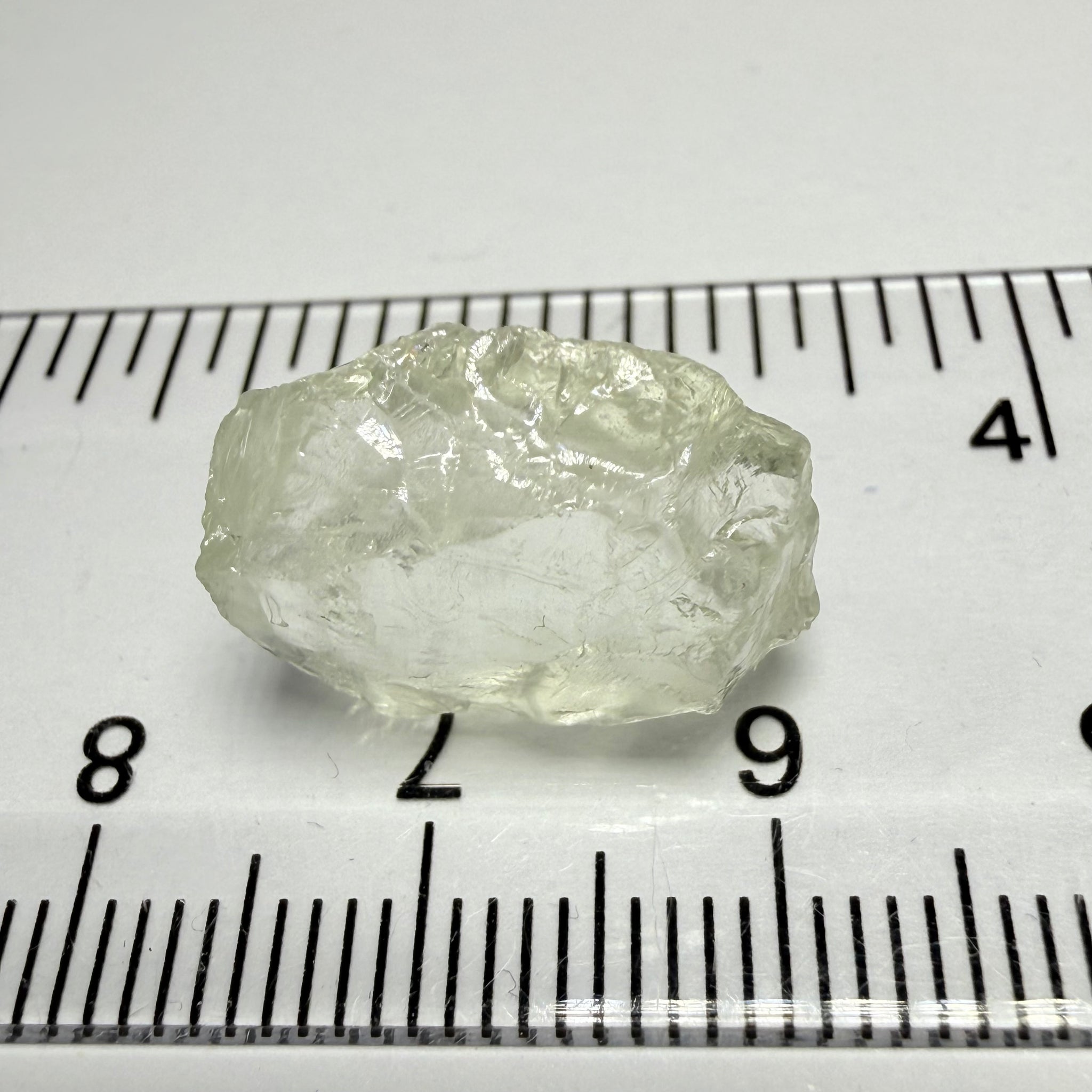 Colourless Beryl, 11.65ct, Loliondo, Tanzania, Untreated Unheated, slightly milky, flattish shape, vs
