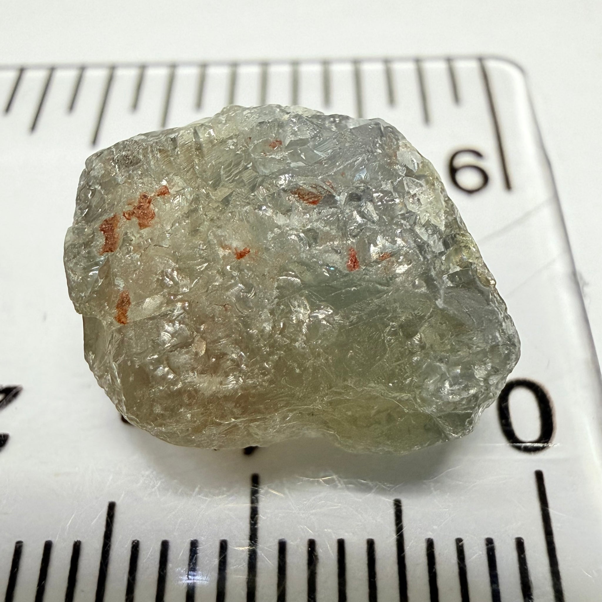 Umba Sapphire, 14.72ct, Umba Valley, Tanzania, Untreated Unheated. Slightly to moderately included,  slight silk, crack going a 1/4 way in. See the backlit pics  I have circled the crack, minor fissures to be removed before faceting