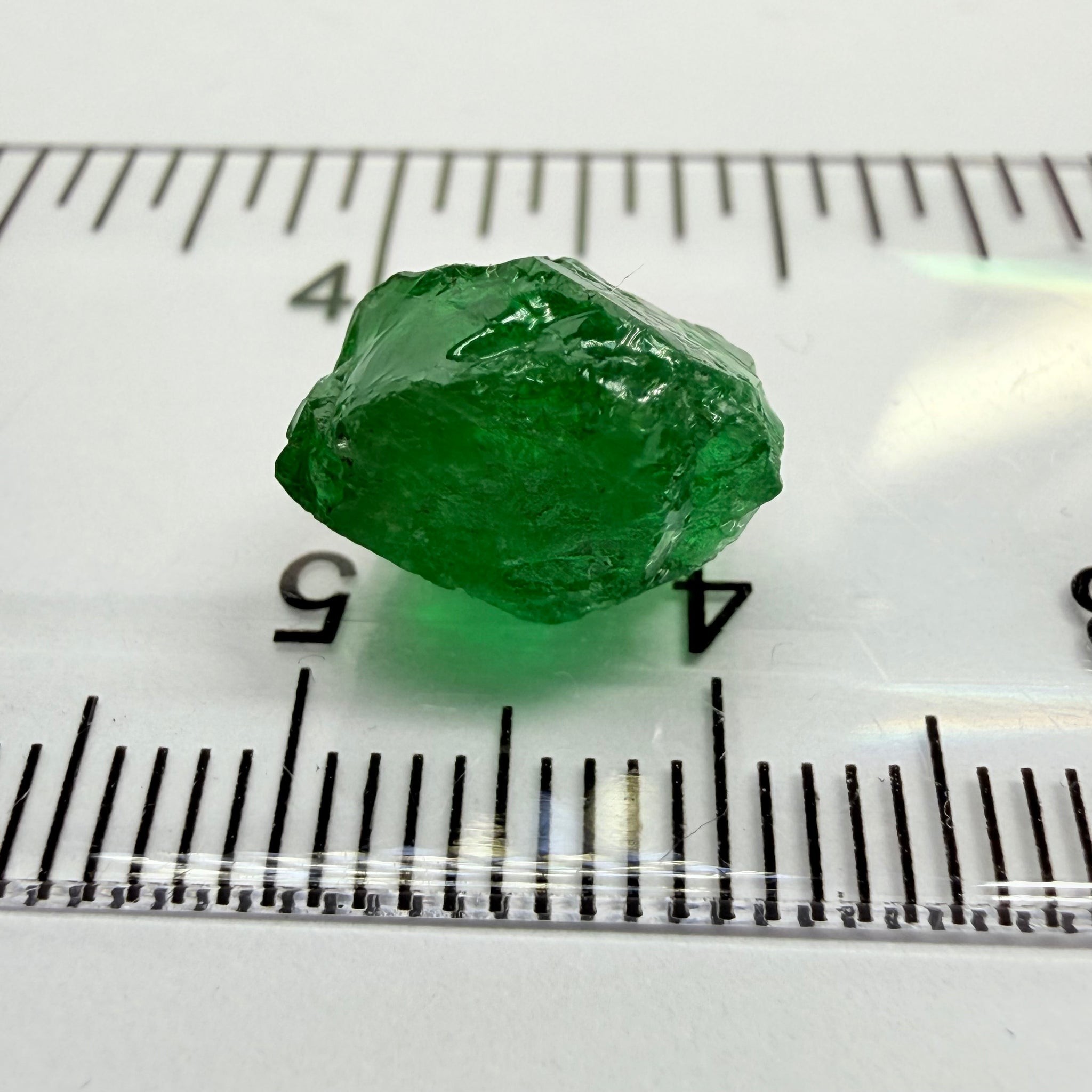 Tsavorite Garnet, 6.91ct, Tanzania, Untreated Unheated. Heavily veiled and moderately included