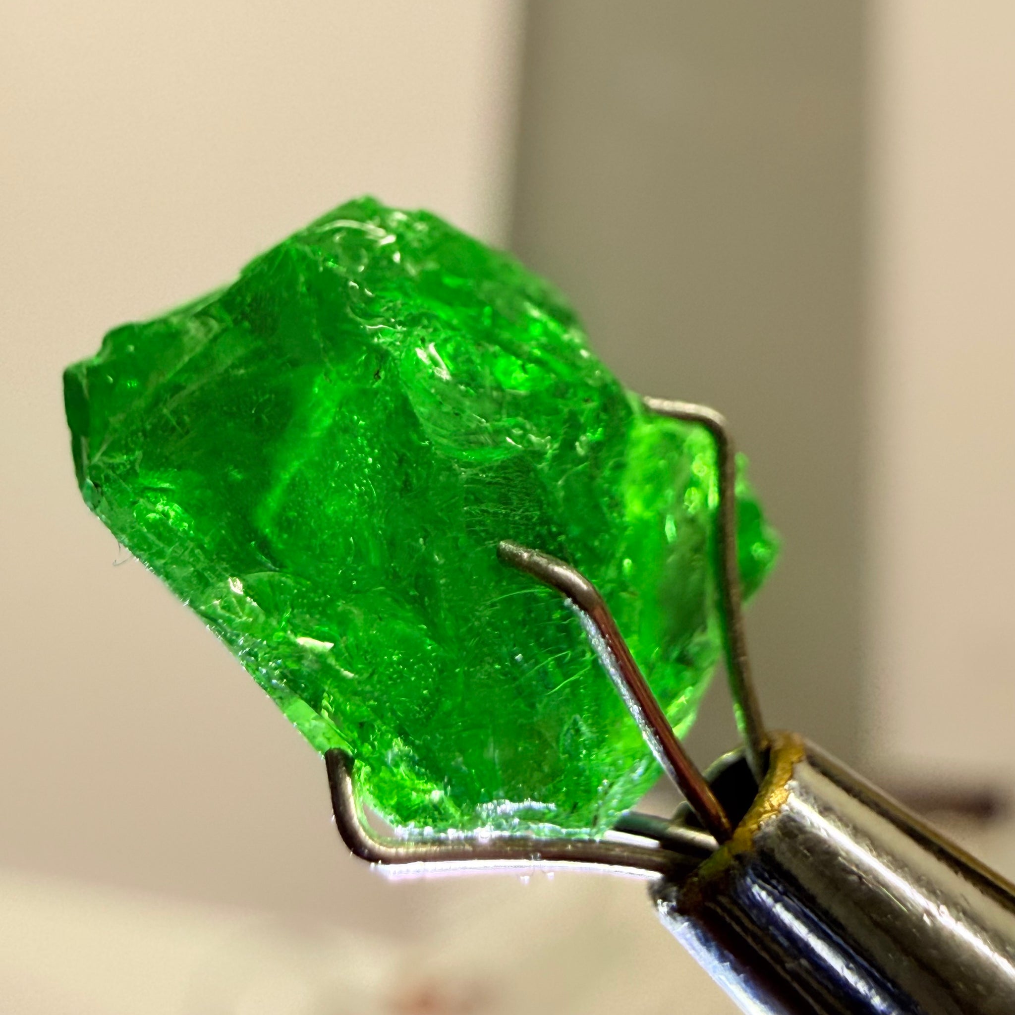 Tsavorite Garnet, 6.91ct, Tanzania, Untreated Unheated. Heavily veiled and moderately included