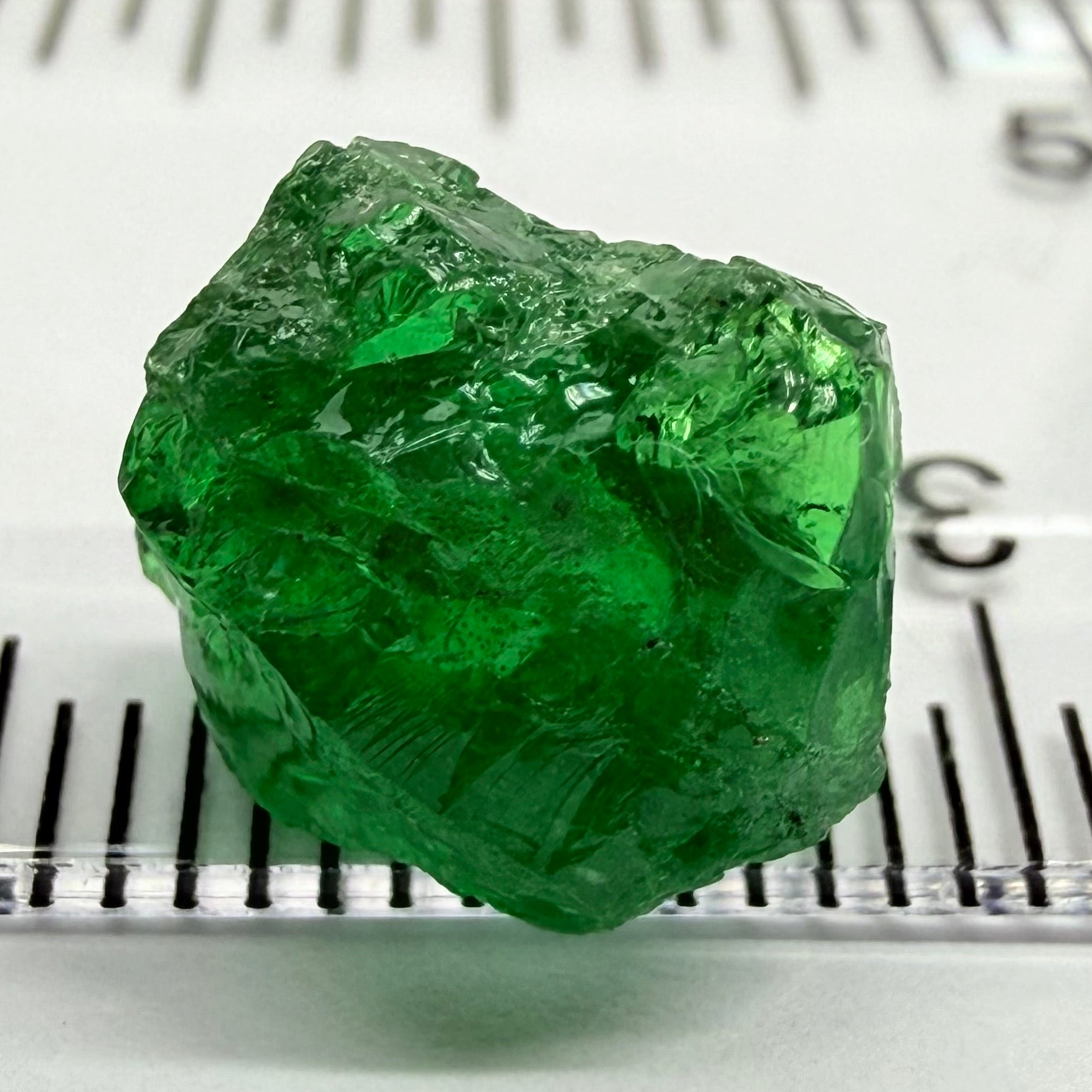 Tsavorite Garnet, 6.91ct, Tanzania, Untreated Unheated. Heavily veiled and moderately included