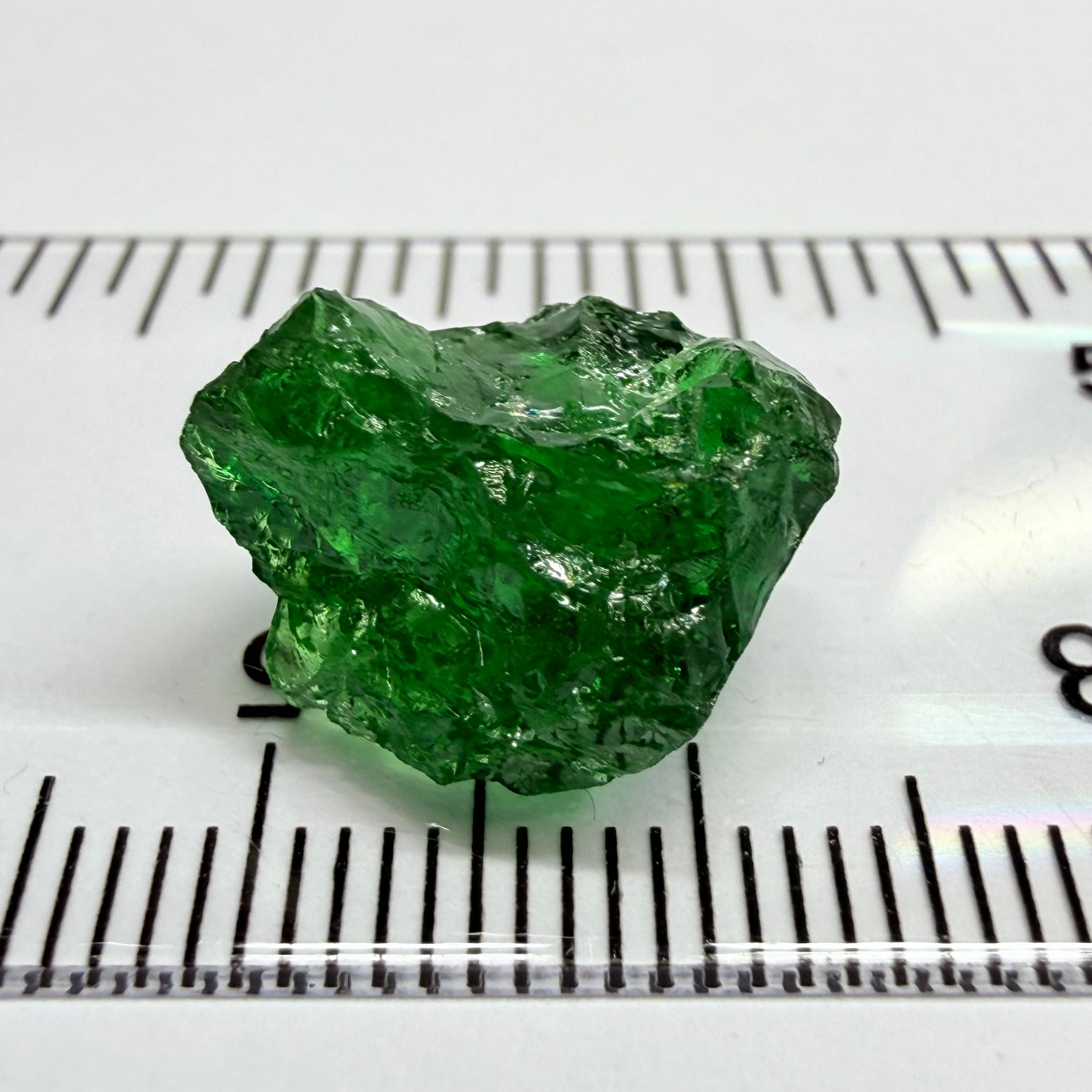 Tsavorite Garnet, 9.32ct, Tanzania, Untreated Unheated. Moderately veiled, see shape, may need to be sliced into 2