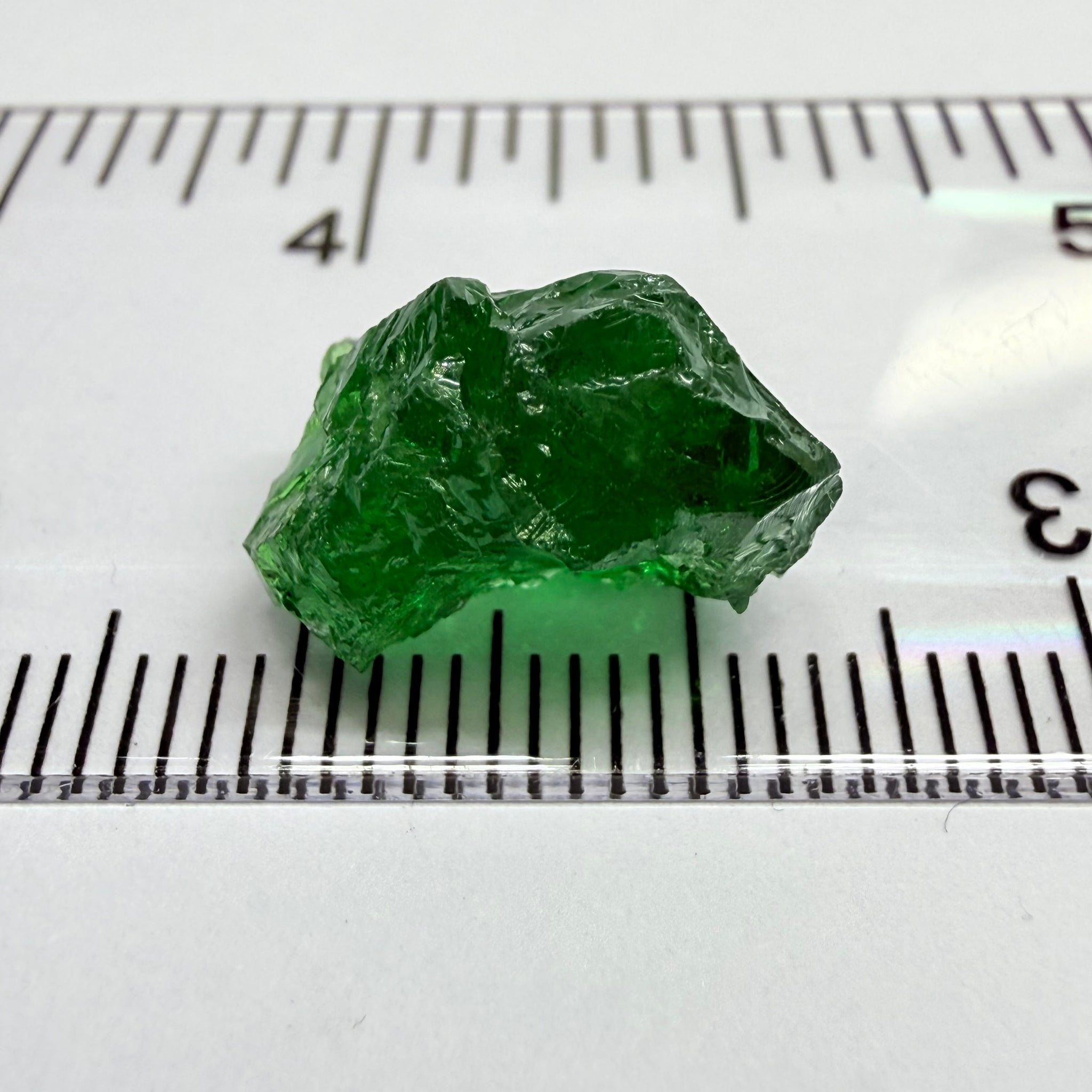 Tsavorite Garnet, 9.32ct, Tanzania, Untreated Unheated. Moderately veiled, see shape, may need to be sliced into 2