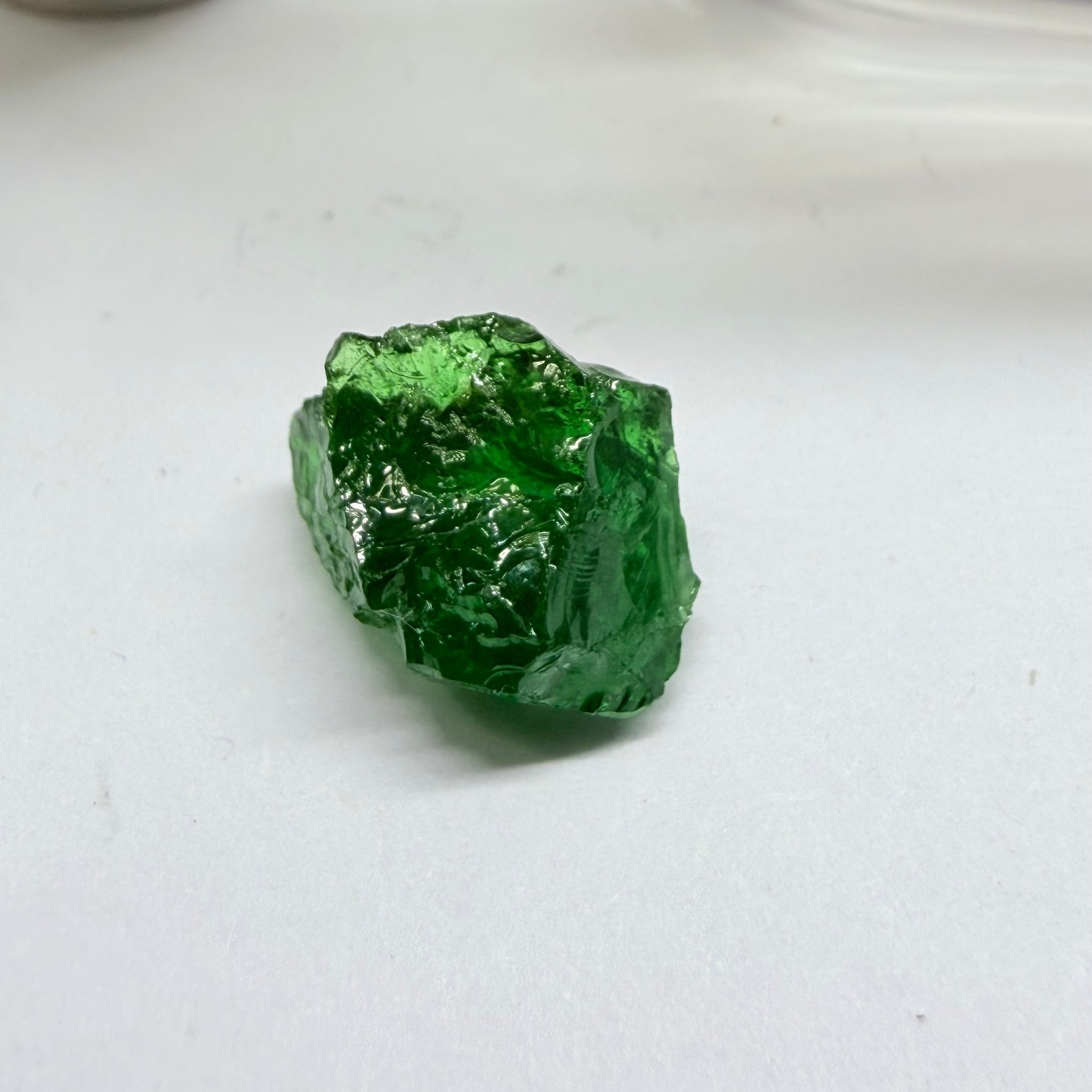 Tsavorite Garnet, 9.32ct, Tanzania, Untreated Unheated. Moderately veiled, see shape, may need to be sliced into 2