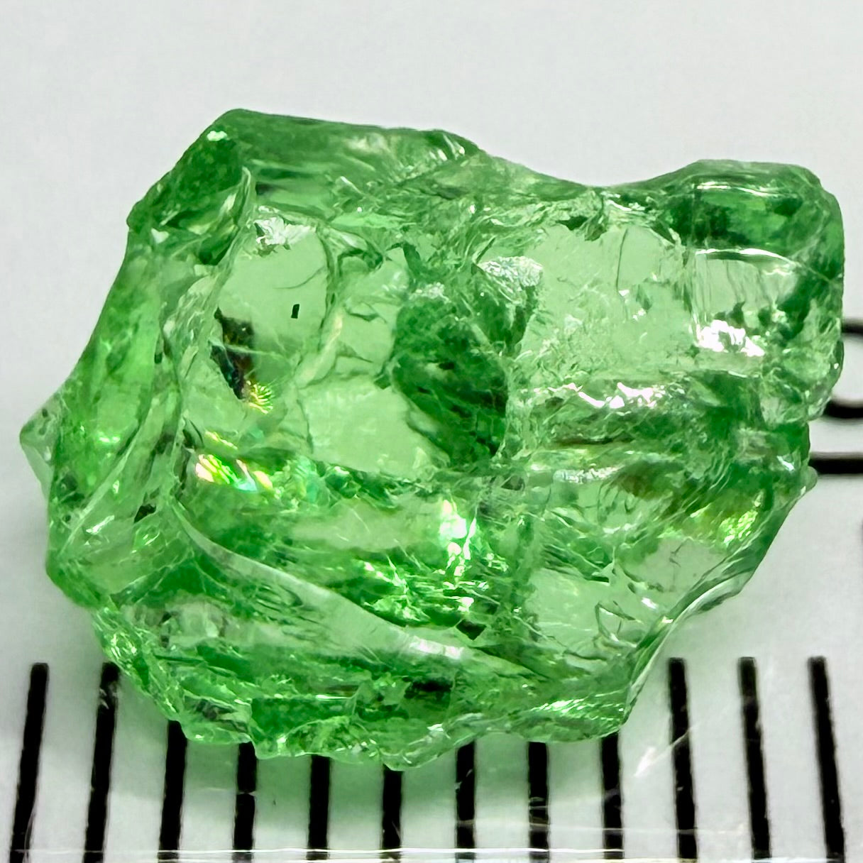 Tsavorite Garnet, 3.52ct, Tanzania, Untreated Unheated. Large cracks inside but great for setting in jewellery as is, flattish shape