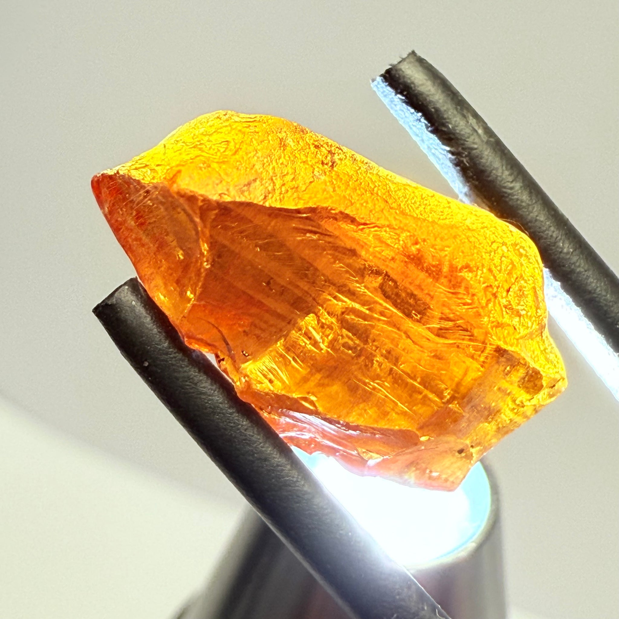 Malaya Garnet, 12.25ct, Super rare size, Tanzania, Untreated Unheated. Just faint parallel silk lines, I have backlit some photos so you can see the silk cannot be seen by the naked eye, very vivid bright colour