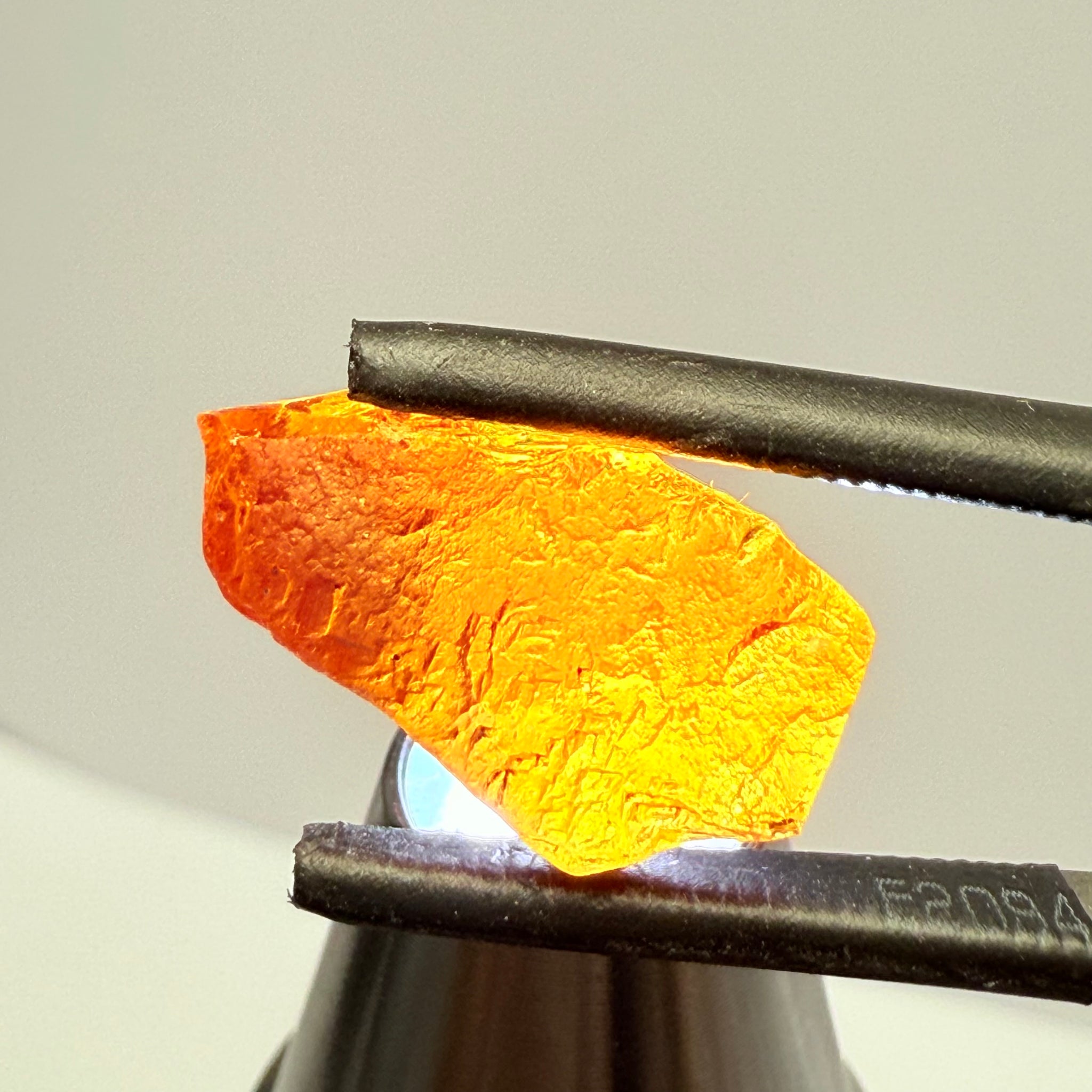 Malaya Garnet, 12.25ct, Super rare size, Tanzania, Untreated Unheated. Just faint parallel silk lines, I have backlit some photos so you can see the silk cannot be seen by the naked eye, very vivid bright colour