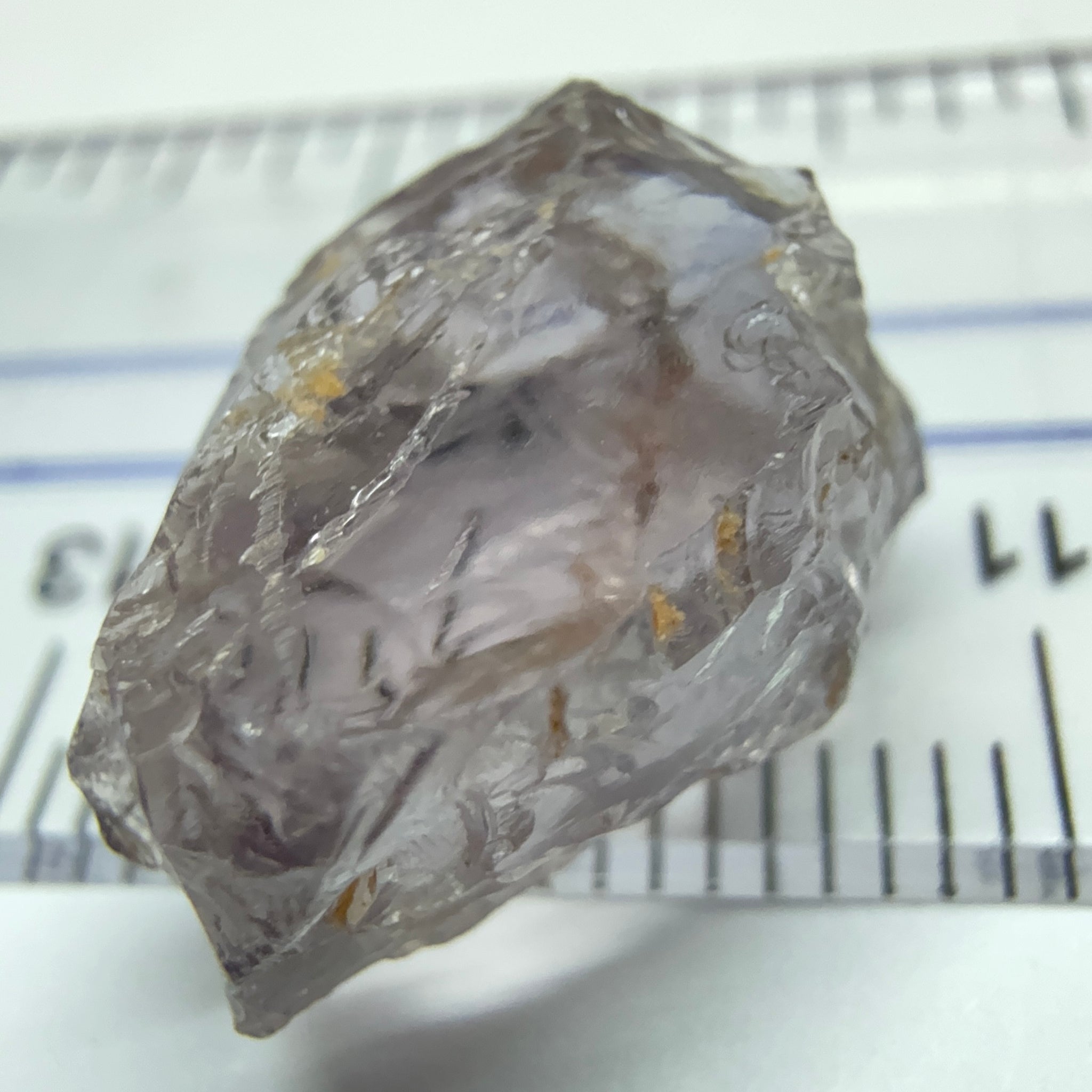 Purple Scapolite Crystal, 11.40ct, Tanzania, Untreated Unheated. Slight issue on the outside that needs to be taken off on disk on faceting, rest VVS-IF clean