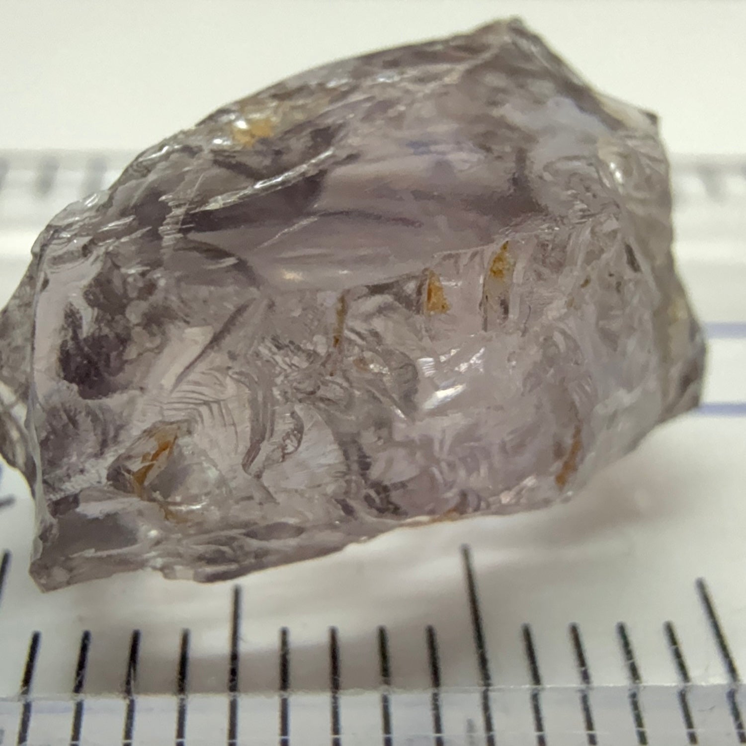 Purple Scapolite Crystal, 11.40ct, Tanzania, Untreated Unheated. Slight issue on the outside that needs to be taken off on disk on faceting, rest VVS-IF clean