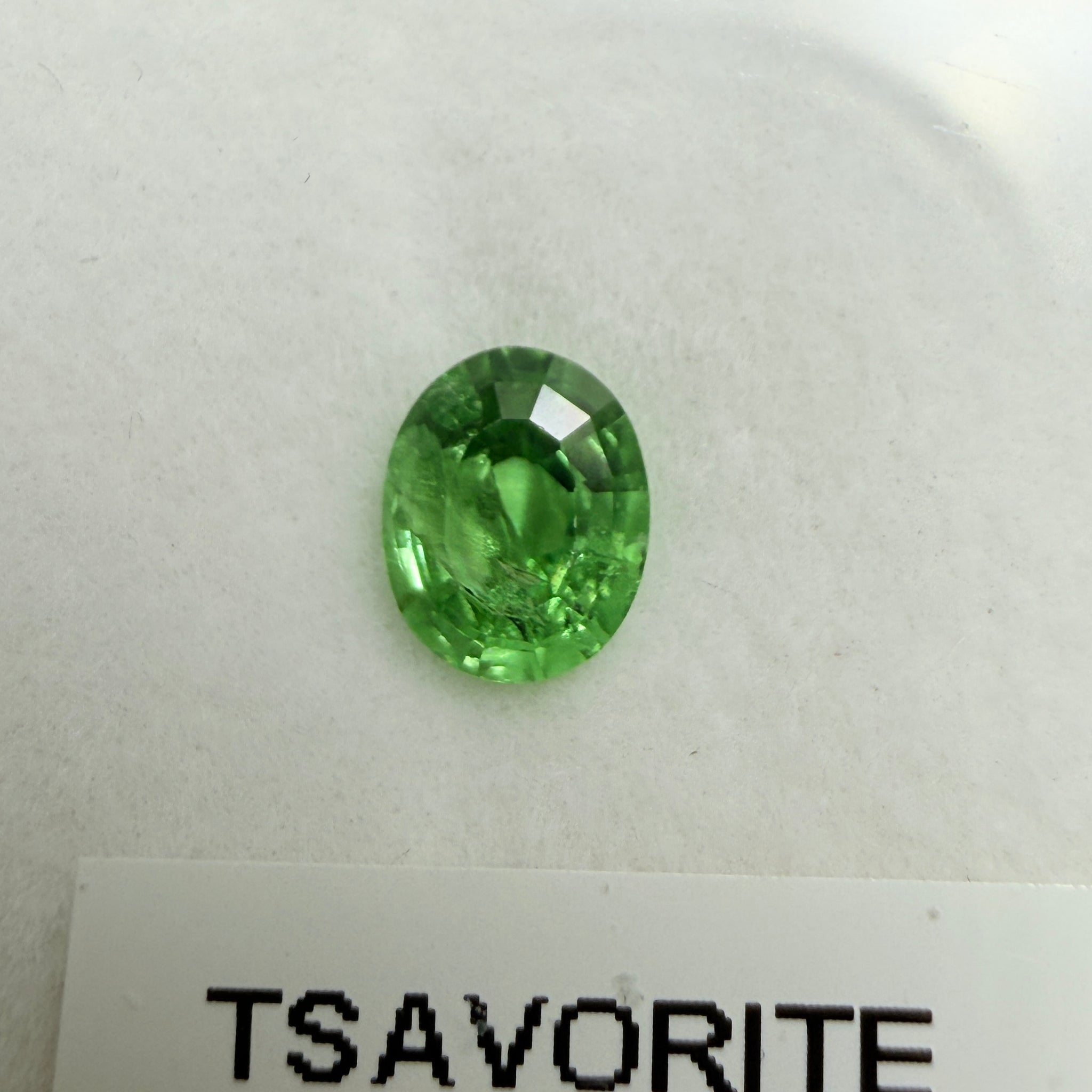Tsavorite Garnet, 0.90ct, Kenya, Unheated Untreated, slight chip on crown facet, native cut.