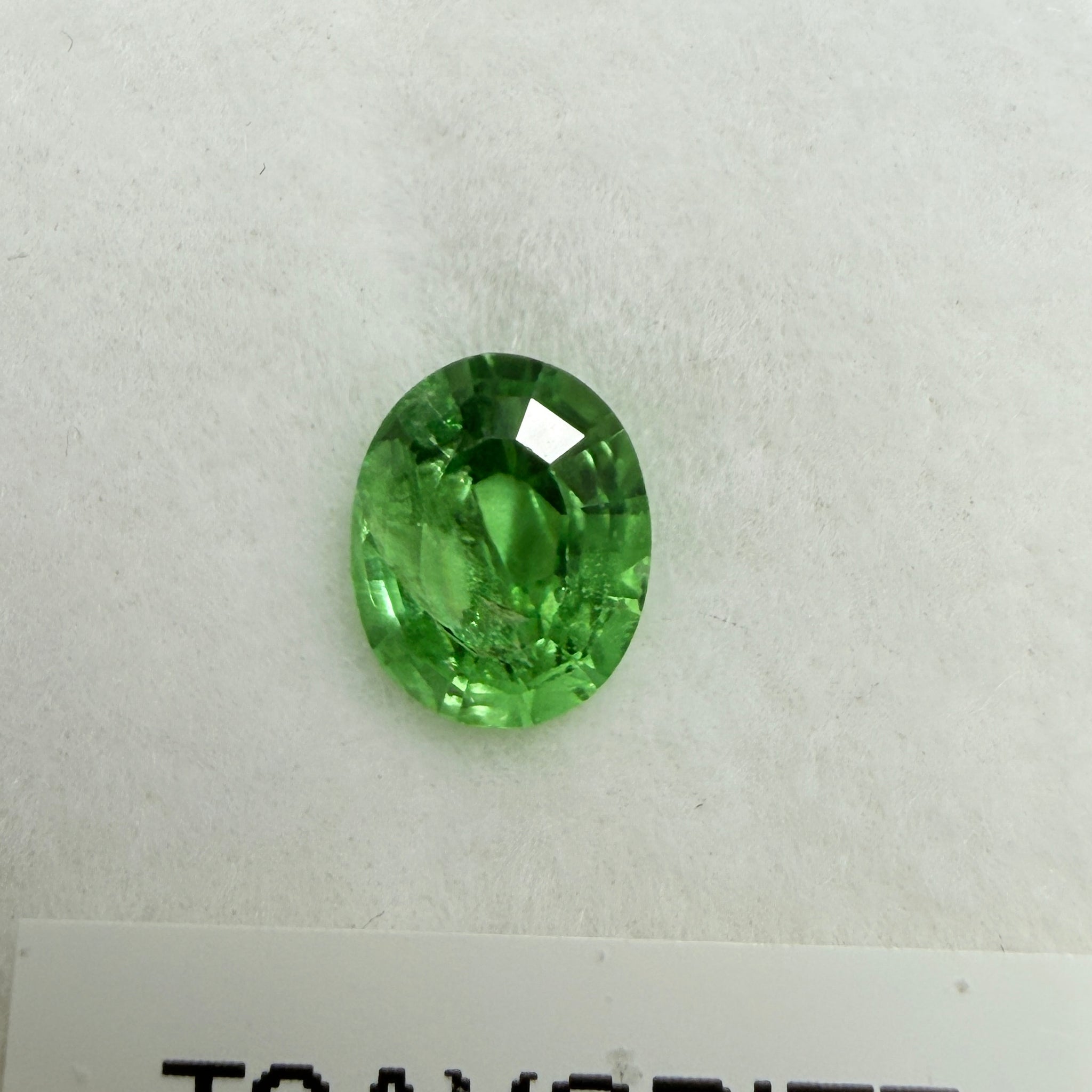 Tsavorite Garnet, 0.90ct, Kenya, Unheated Untreated, slight chip on crown facet, native cut.