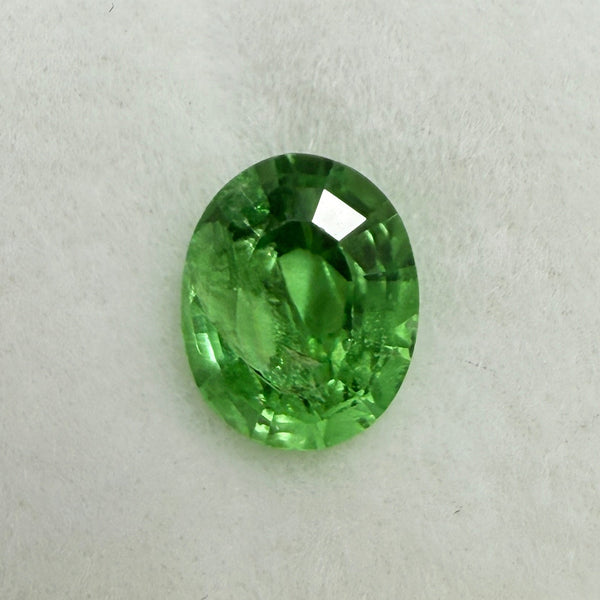 Tsavorite Garnet, 0.90ct, Kenya, Unheated Untreated, slight chip on crown facet, native cut.