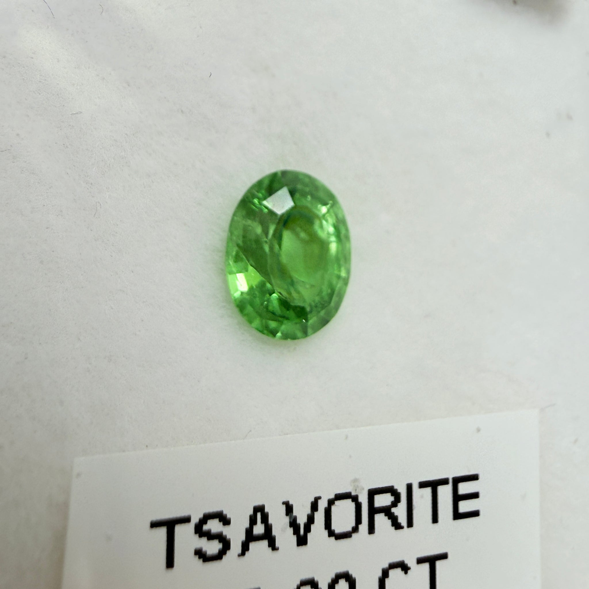Tsavorite Garnet, 0.90ct, Kenya, Unheated Untreated, slight chip on crown facet, native cut.