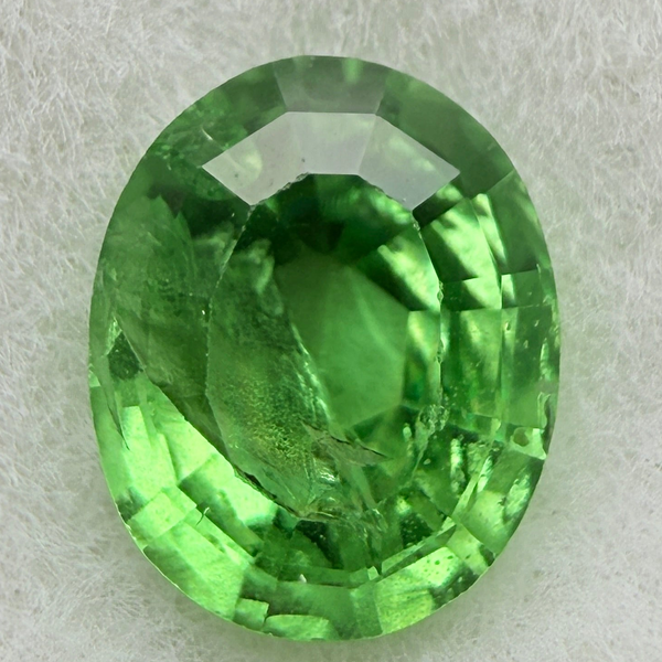 Tsavorite Garnet, 0.90ct, Kenya, Unheated Untreated, slight chip on crown facet, native cut.