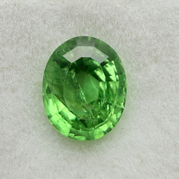 Tsavorite Garnet, 0.90ct, Kenya, Unheated Untreated, slight chip on crown facet, native cut.