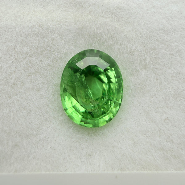 Tsavorite Garnet, 0.90ct, Kenya, Unheated Untreated, slight chip on crown facet, native cut.