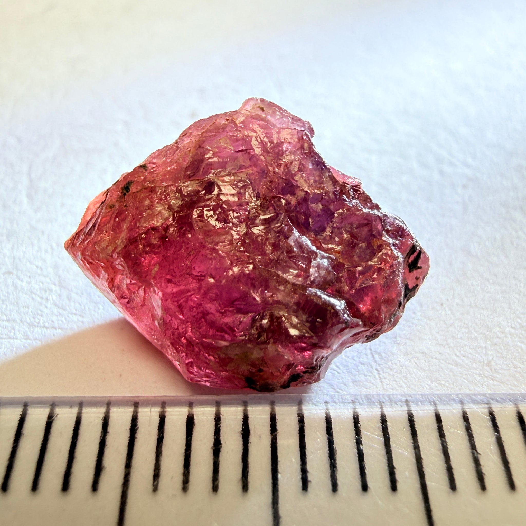 Winza Sapphire, 7.35ct, Tanzania, Untreated Unheated, half of the stone can be ground off, other half vs, see pics in hand backlit