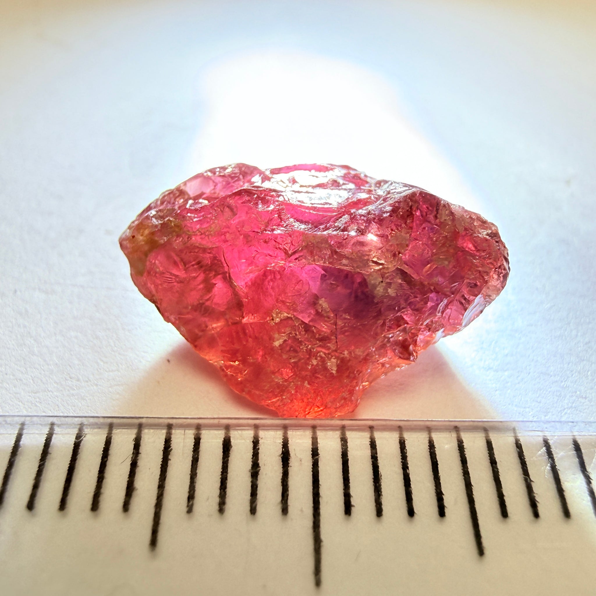 Winza Sapphire, 7.35ct, Tanzania, Untreated Unheated, half of the stone can be ground off, other half vs, see pics in hand backlit