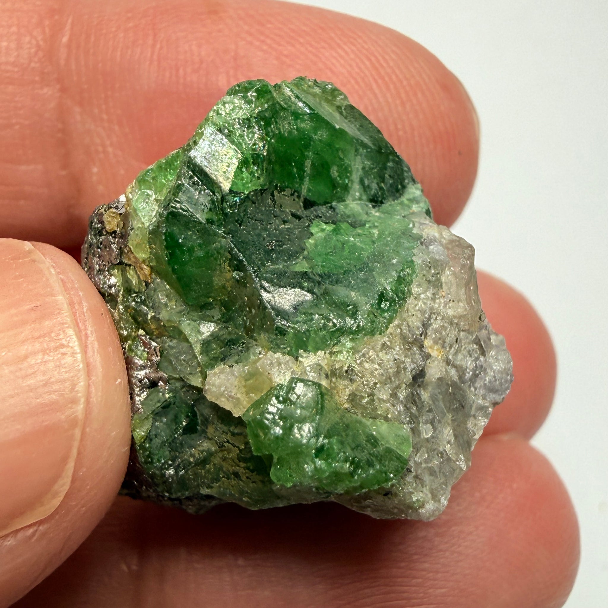 Tsavorite Garnet Crystal with a little bit of Tanzanite, on matrix, 72.31ct, Merelani, Tanzania, Untreated Unheated