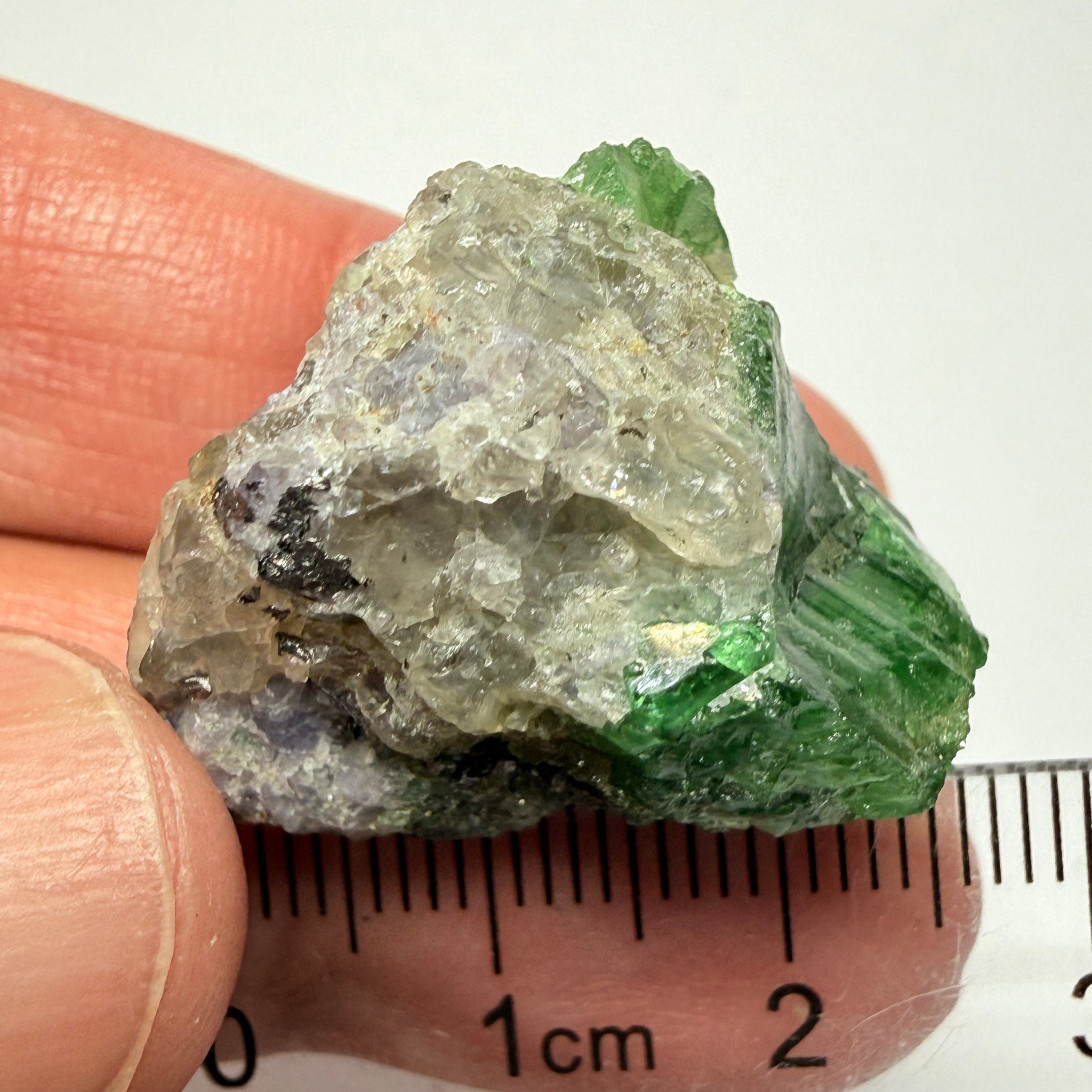 Tsavorite Garnet Crystal with a little bit of Tanzanite, on matrix, 72.31ct, Merelani, Tanzania, Untreated Unheated
