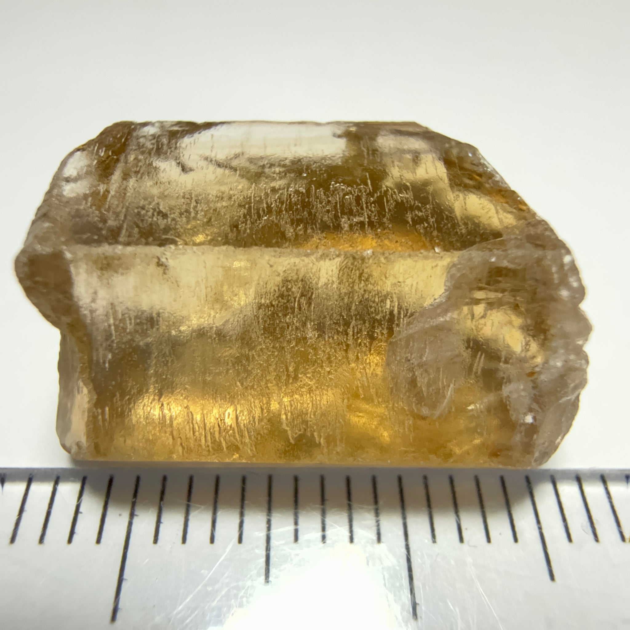 Citrine, 20.23ct, Zambia, Untreated Unheated, VVS-IF, skin fracture no effect on faceting recovery rate but forms a really nice rainbow!