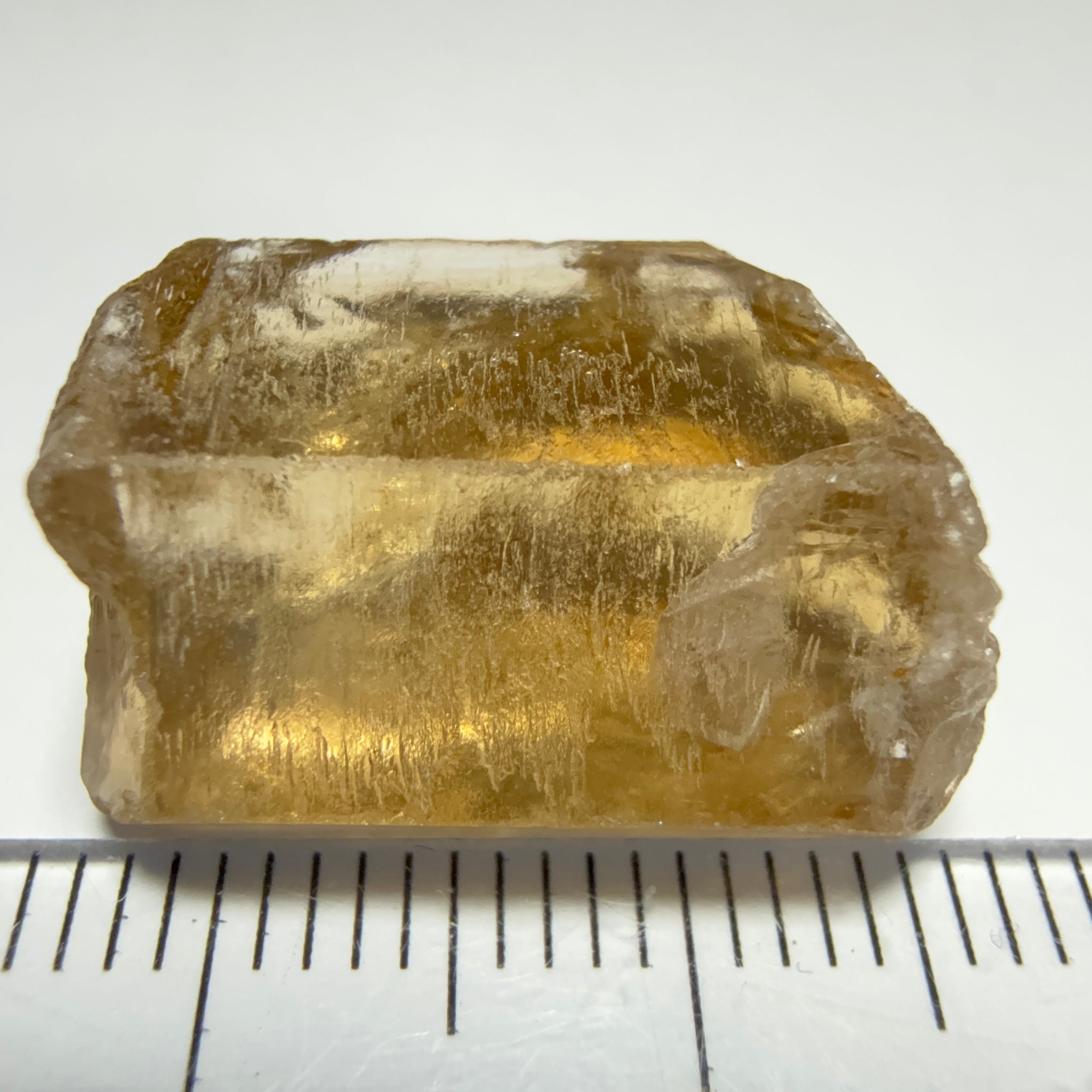 Citrine, 20.23ct, Zambia, Untreated Unheated, VVS-IF, skin fracture no effect on faceting recovery rate but forms a really nice rainbow!