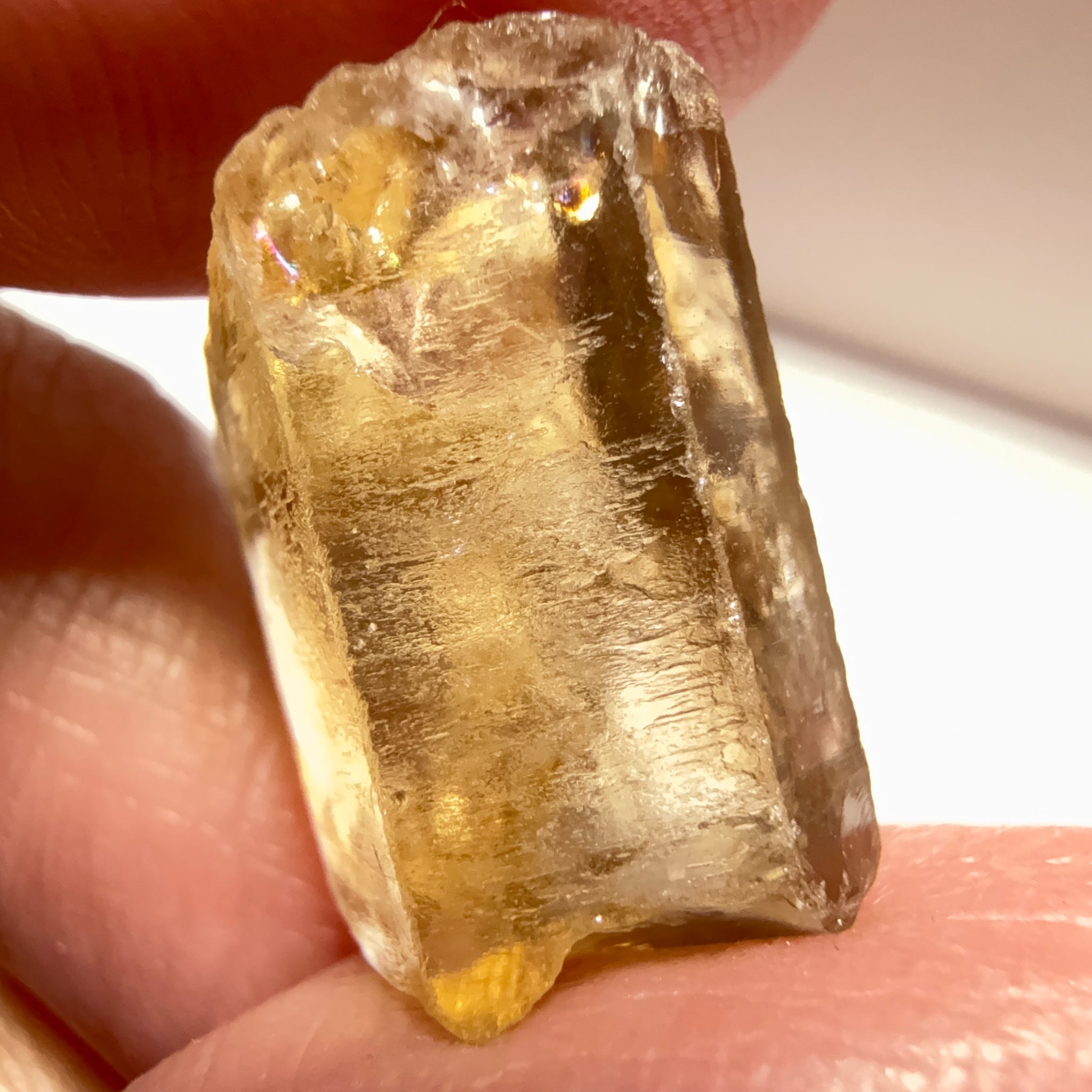 Citrine, 20.23ct, Zambia, Untreated Unheated, VVS-IF, skin fracture no effect on faceting recovery rate but forms a really nice rainbow!