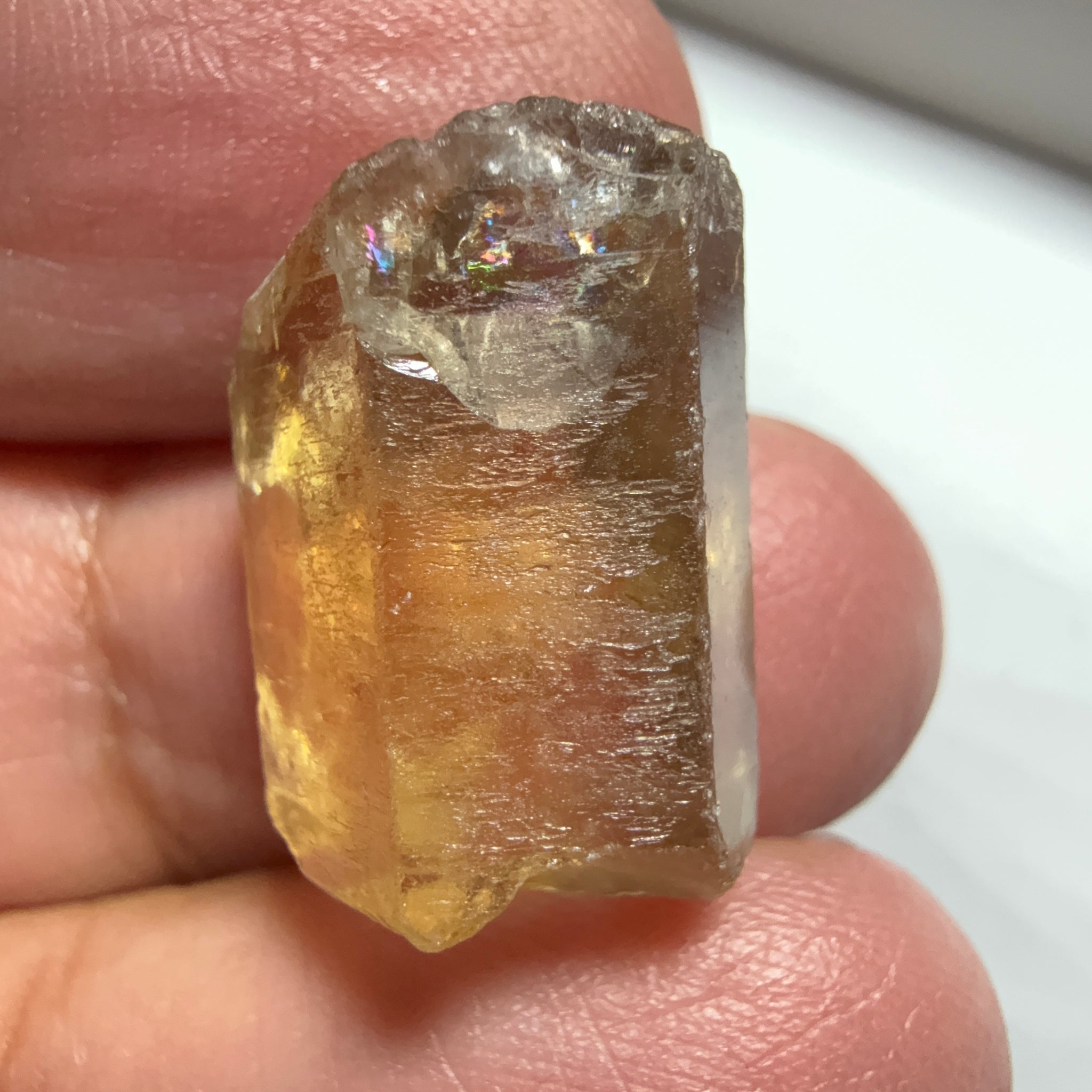 Citrine, 20.23ct, Zambia, Untreated Unheated, VVS-IF, skin fracture no effect on faceting recovery rate but forms a really nice rainbow!