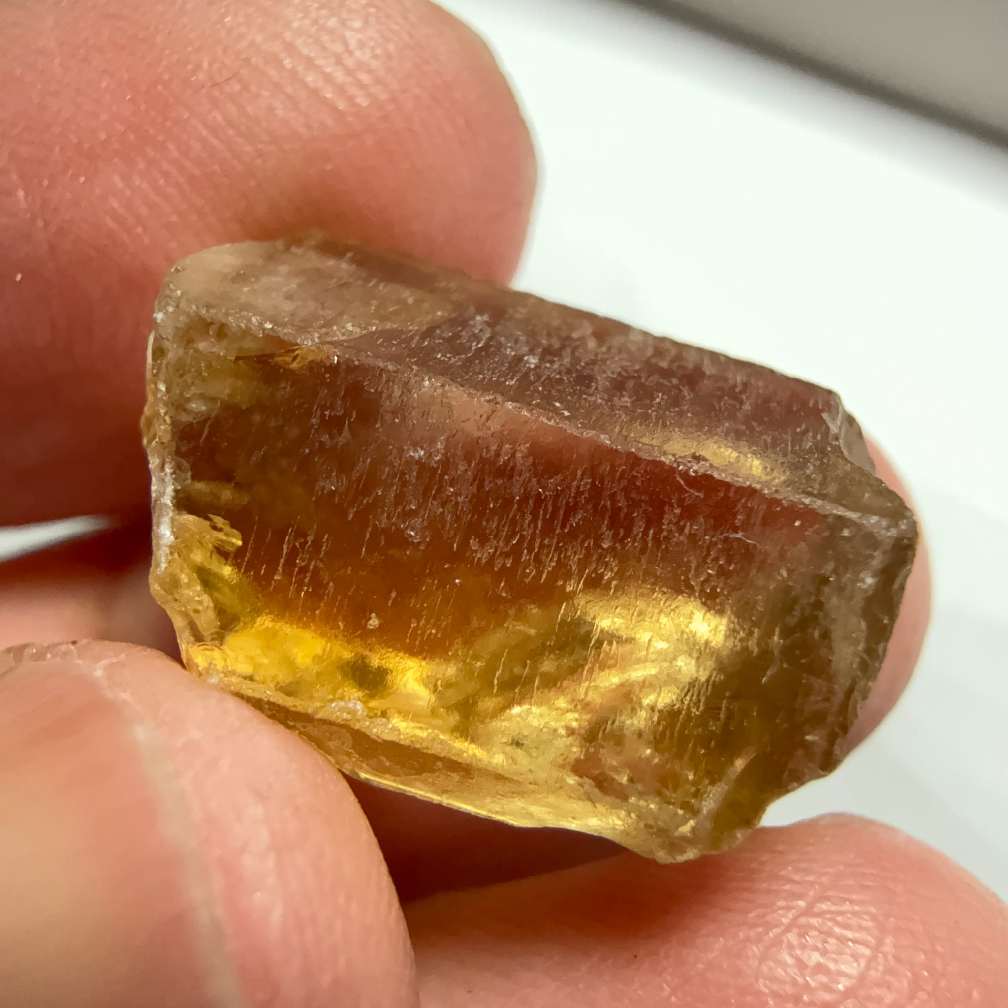 Citrine, 20.23ct, Zambia, Untreated Unheated, VVS-IF, skin fracture no effect on faceting recovery rate but forms a really nice rainbow!