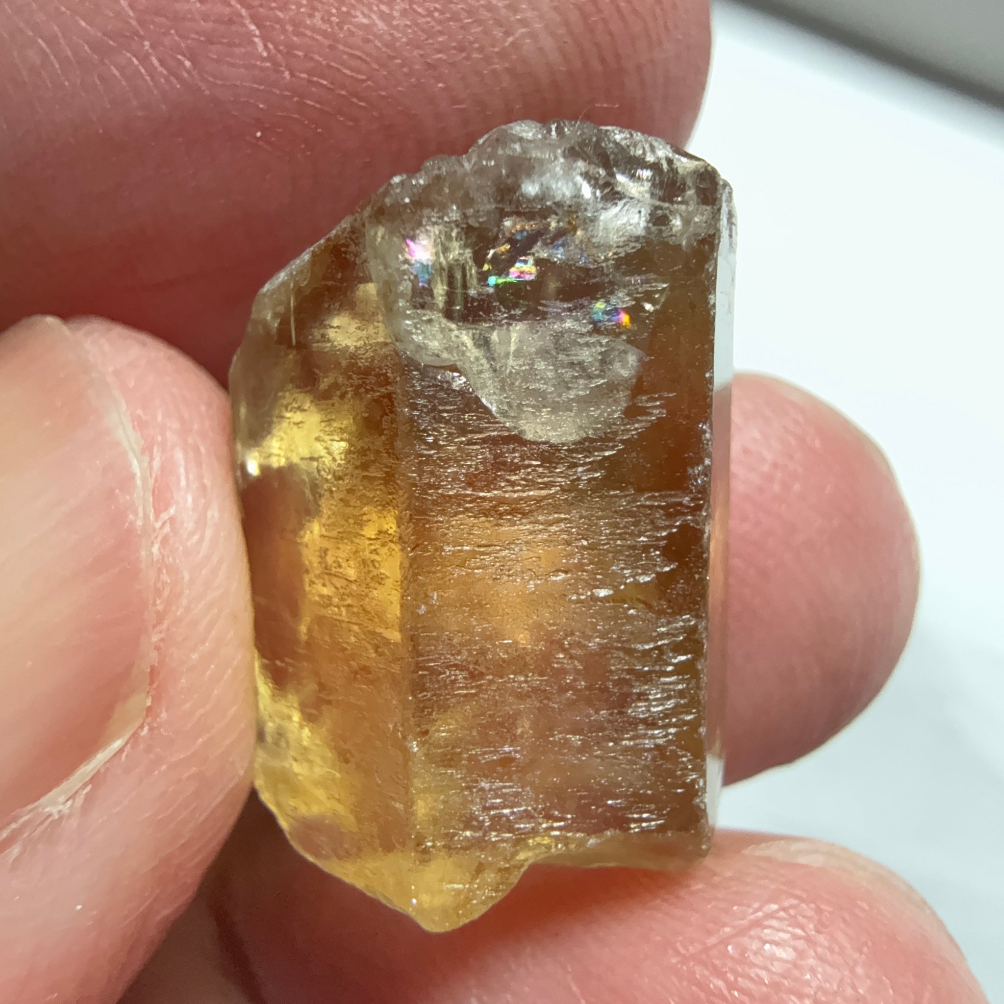 Citrine, 20.23ct, Zambia, Untreated Unheated, VVS-IF, skin fracture no effect on faceting recovery rate but forms a really nice rainbow!