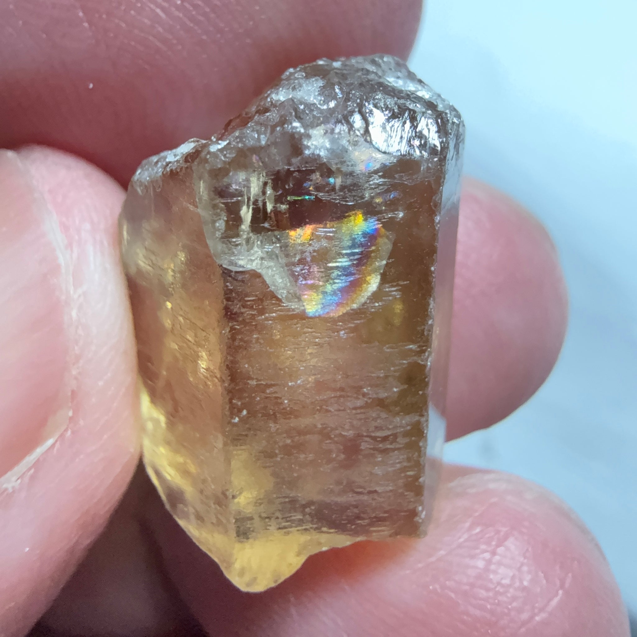 Citrine, 20.23ct, Zambia, Untreated Unheated, VVS-IF, skin fracture no effect on faceting recovery rate but forms a really nice rainbow!
