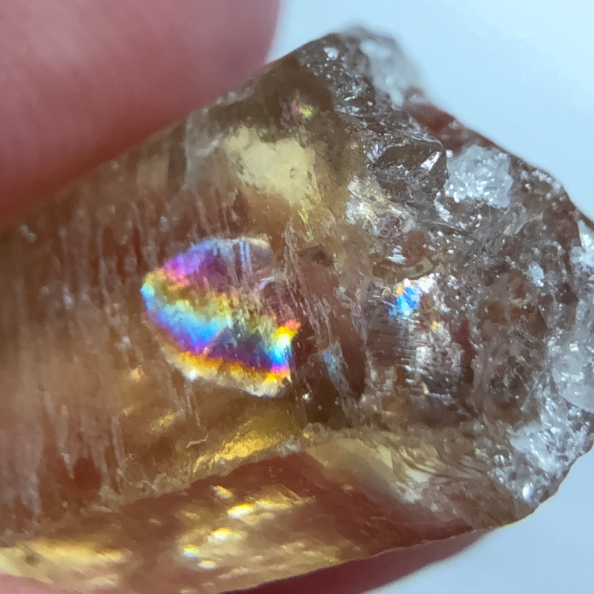 Citrine, 20.23ct, Zambia, Untreated Unheated, VVS-IF, skin fracture no effect on faceting recovery rate but forms a really nice rainbow!