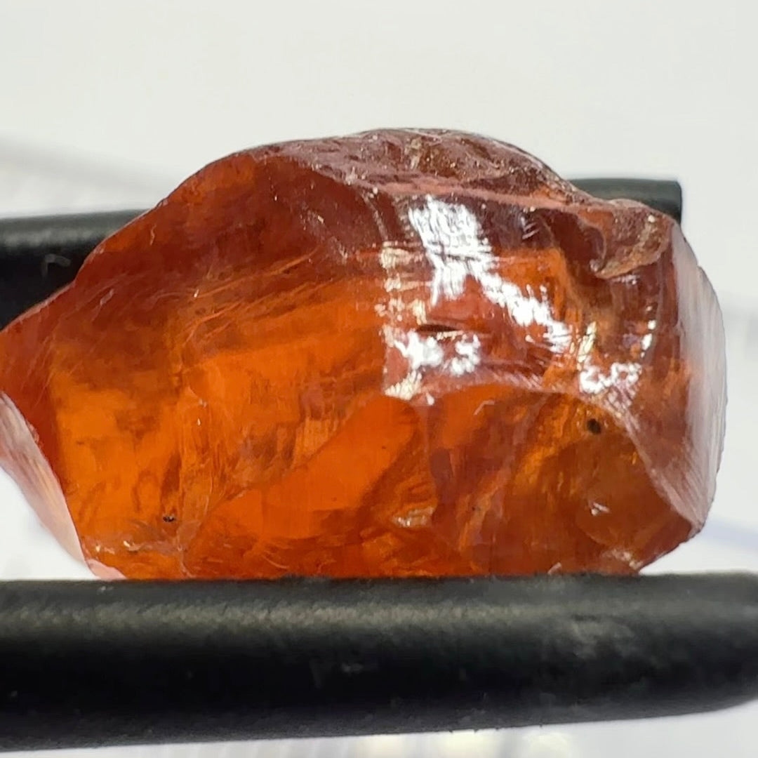 Malaya Garnet, 12.25ct, Super rare size, Tanzania, Untreated Unheated. Just faint parallel silk lines, I have backlit some photos so you can see the silk cannot be seen by the naked eye, very vivid bright colour