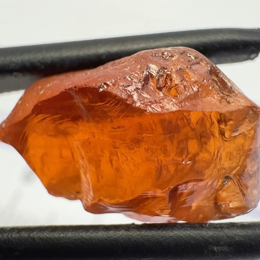 Malaya Garnet, 12.25ct, Super rare size, Tanzania, Untreated Unheated. Just faint parallel silk lines, I have backlit some photos so you can see the silk cannot be seen by the naked eye, very vivid bright colour