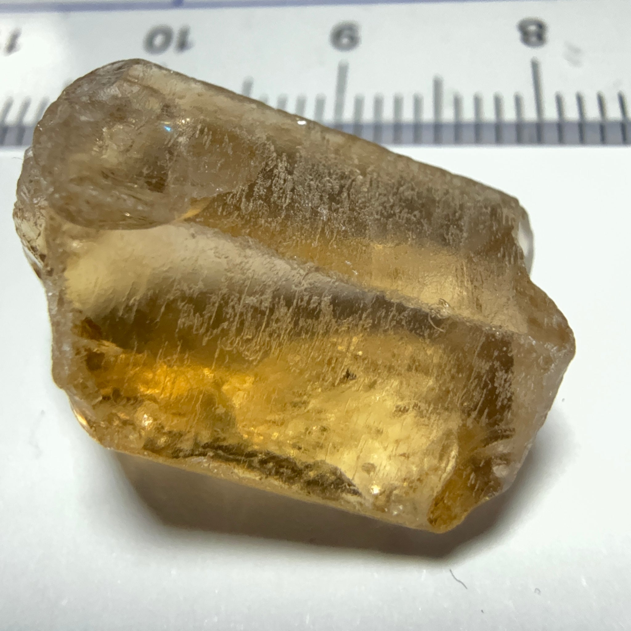 Citrine, 20.23ct, Zambia, Untreated Unheated, VVS-IF, skin fracture no effect on faceting recovery rate but forms a really nice rainbow!