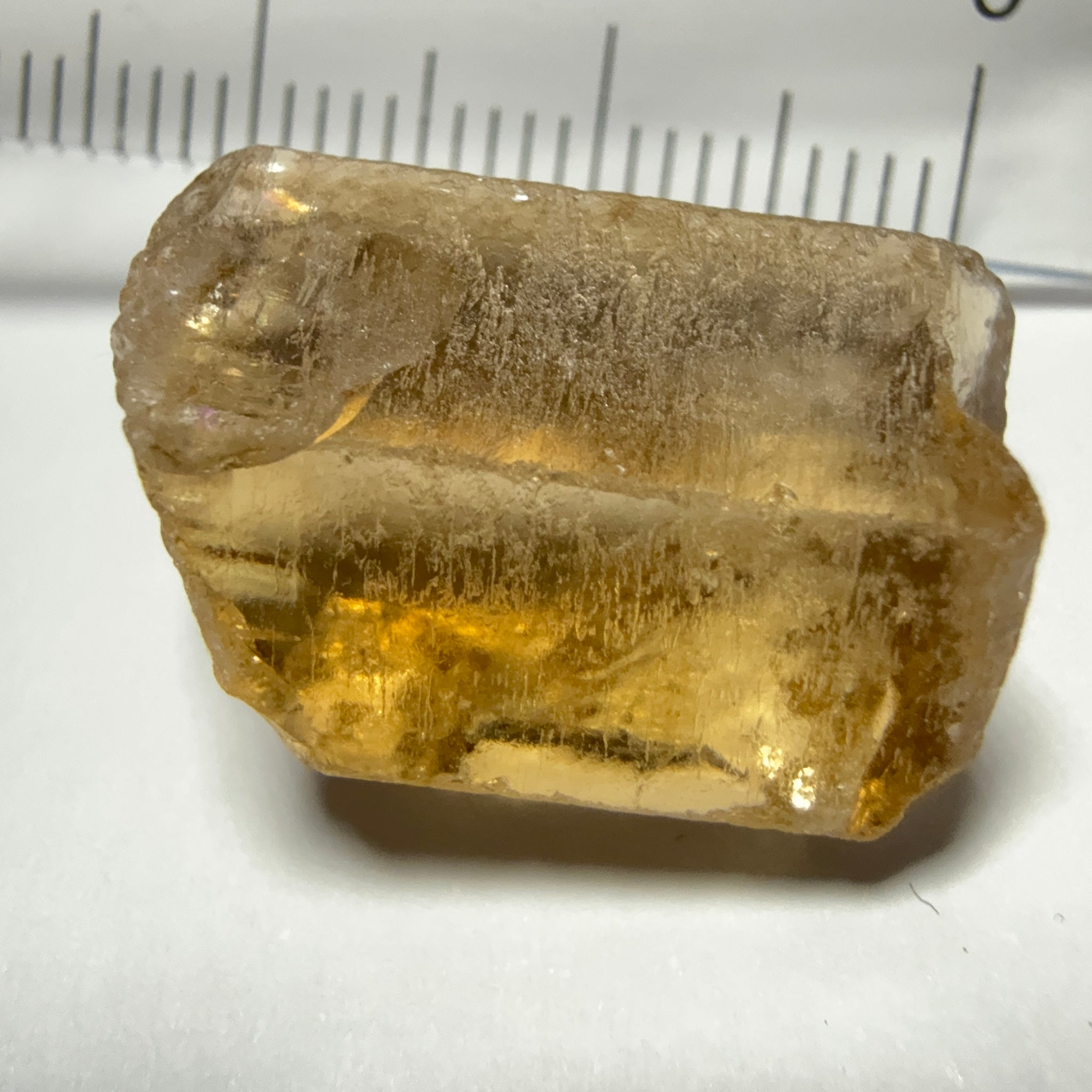 Citrine, 20.23ct, Zambia, Untreated Unheated, VVS-IF, skin fracture no effect on faceting recovery rate but forms a really nice rainbow!