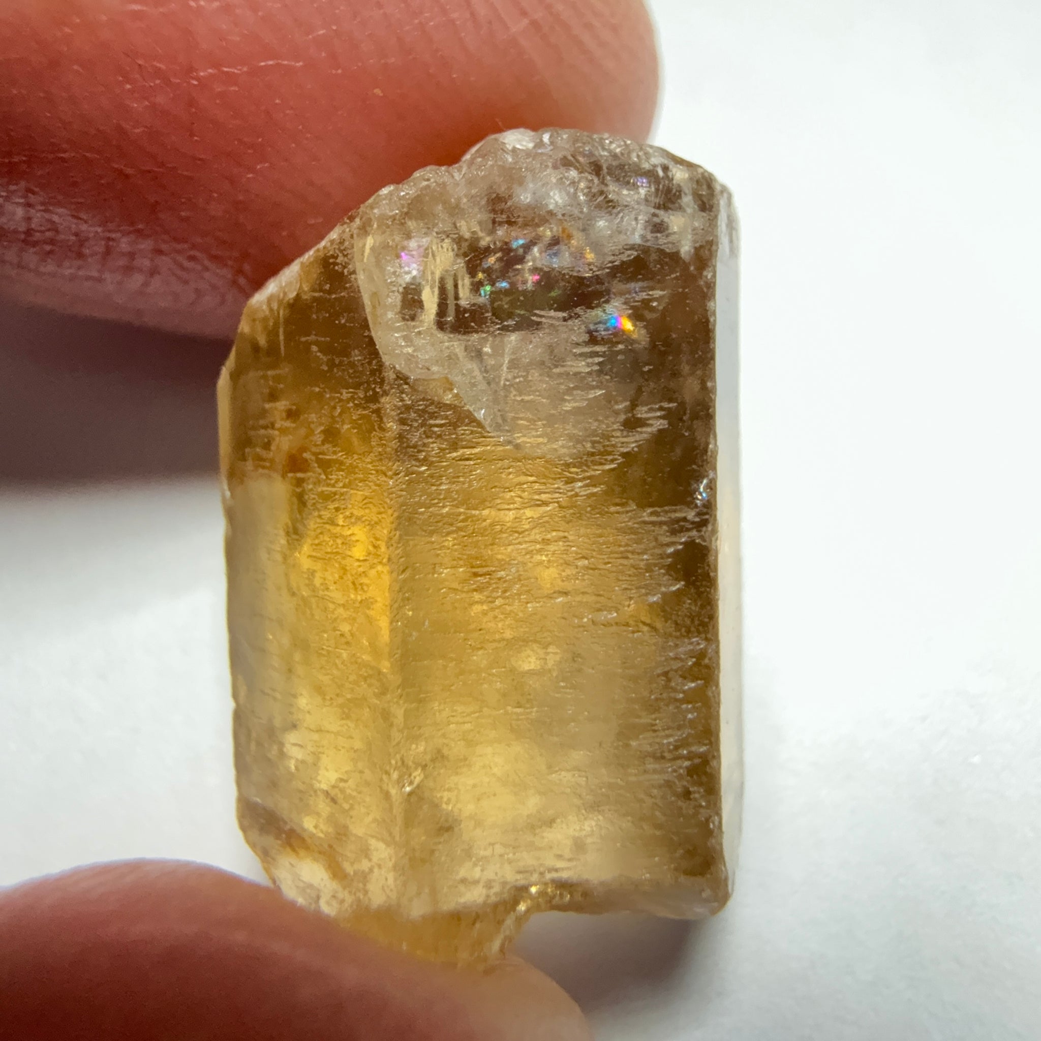 Citrine, 20.23ct, Zambia, Untreated Unheated, VVS-IF, skin fracture no effect on faceting recovery rate but forms a really nice rainbow!