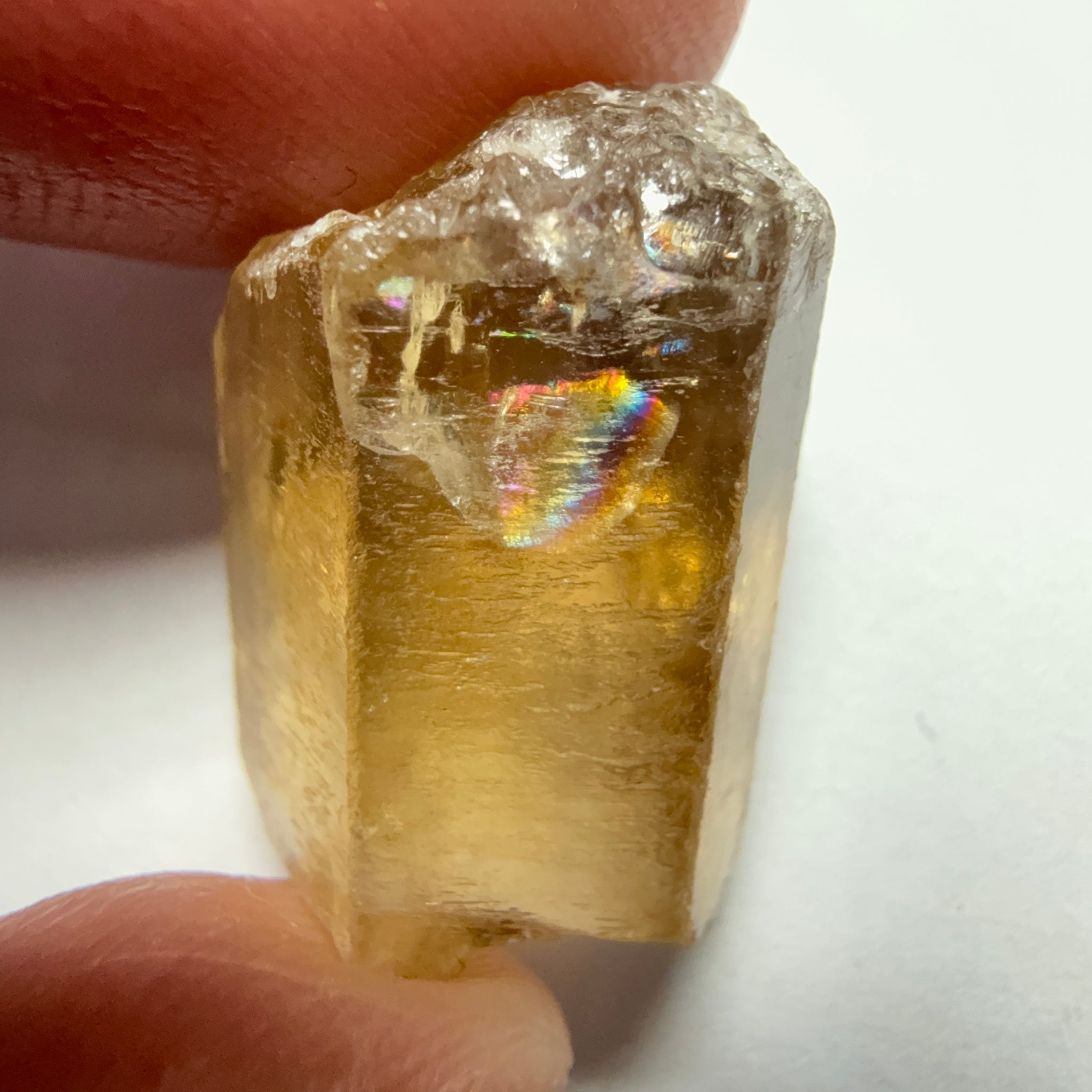 Citrine, 20.23ct, Zambia, Untreated Unheated, VVS-IF, skin fracture no effect on faceting recovery rate but forms a really nice rainbow!