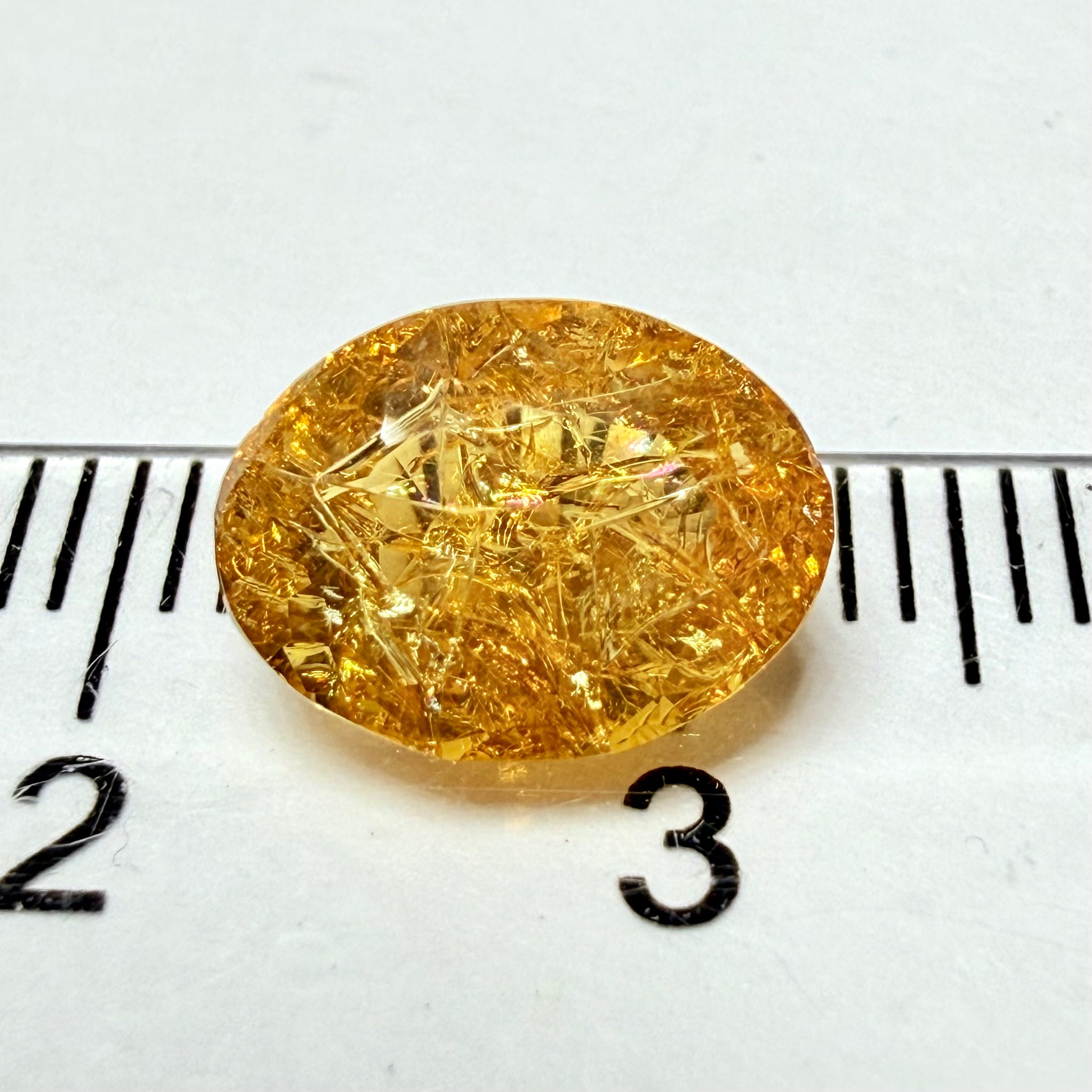 Ethiopian Opal that we cut 17 years ago and fractured internally, seems stable and none of the facets have broken, we thought it was quite pretty, from the initial Ethiopian Opal deposit, 1.43ct, Ethiopia, Untreated Unheated