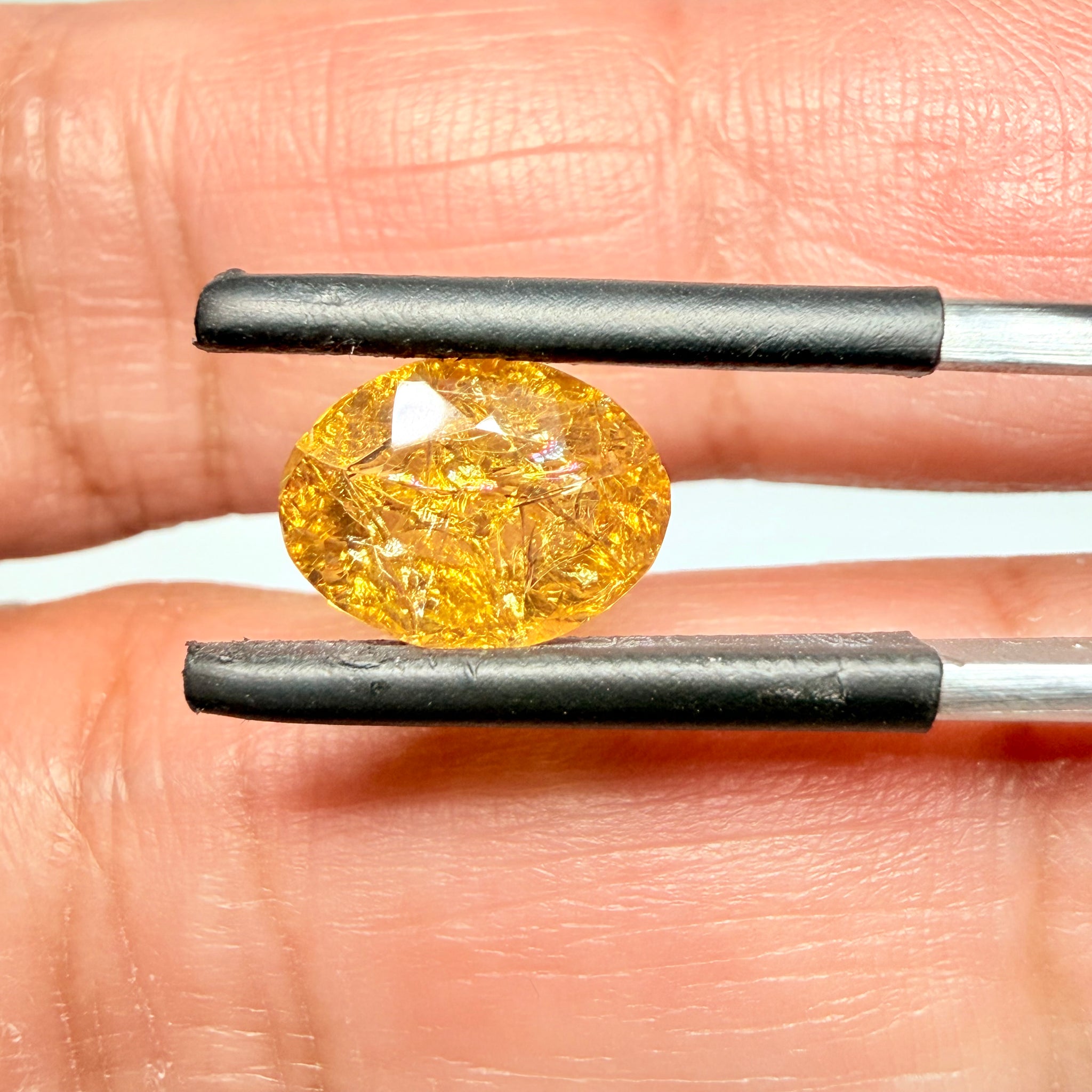 Ethiopian Opal that we cut 17 years ago and fractured internally, seems stable and none of the facets have broken, we thought it was quite pretty, from the initial Ethiopian Opal deposit, 1.43ct, Ethiopia, Untreated Unheated